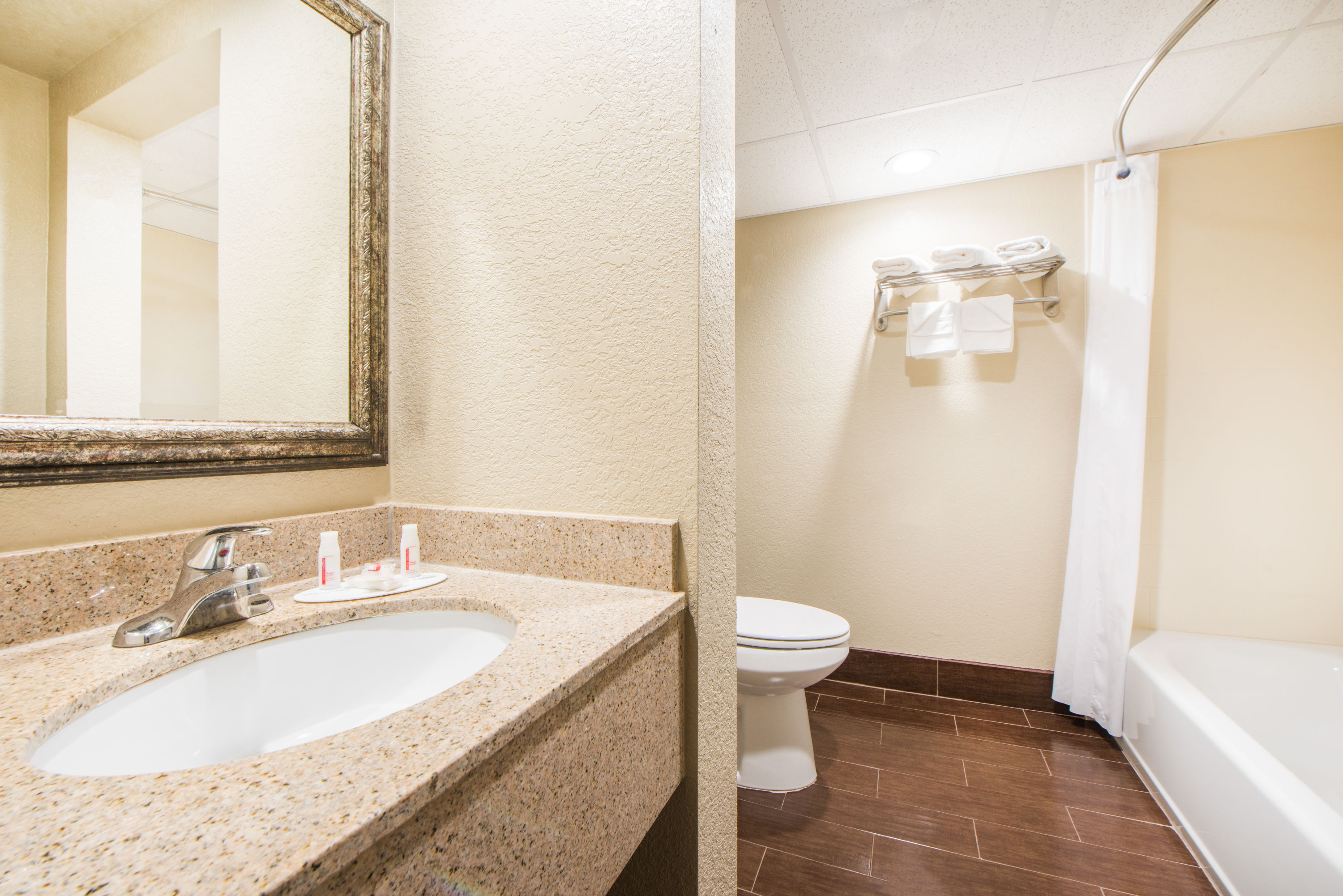 Guest room bath at the Days Inn by Wyndham Joplin in Joplin, Missouri