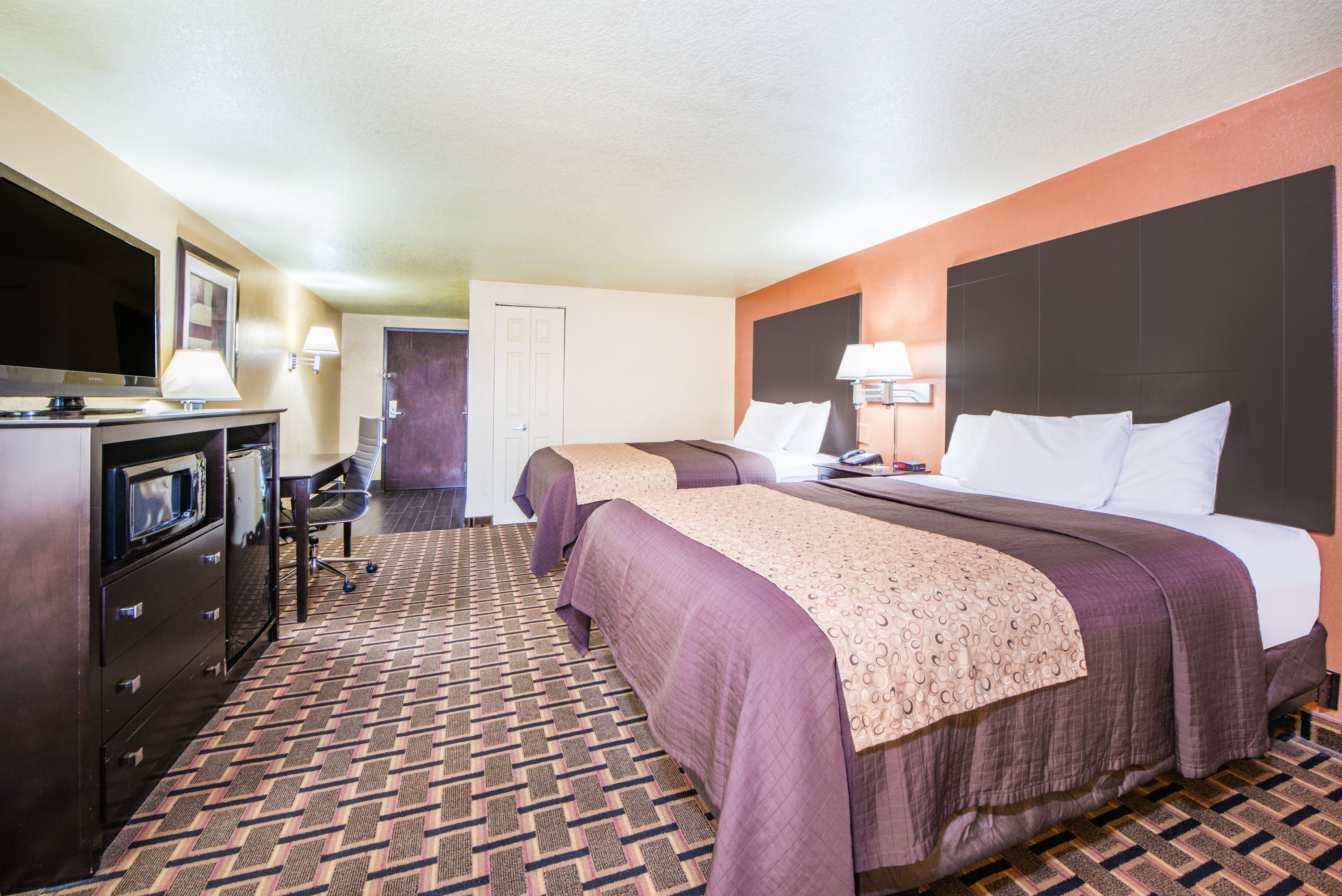 Guest room at the Days Inn by Wyndham Joplin in Joplin, Missouri