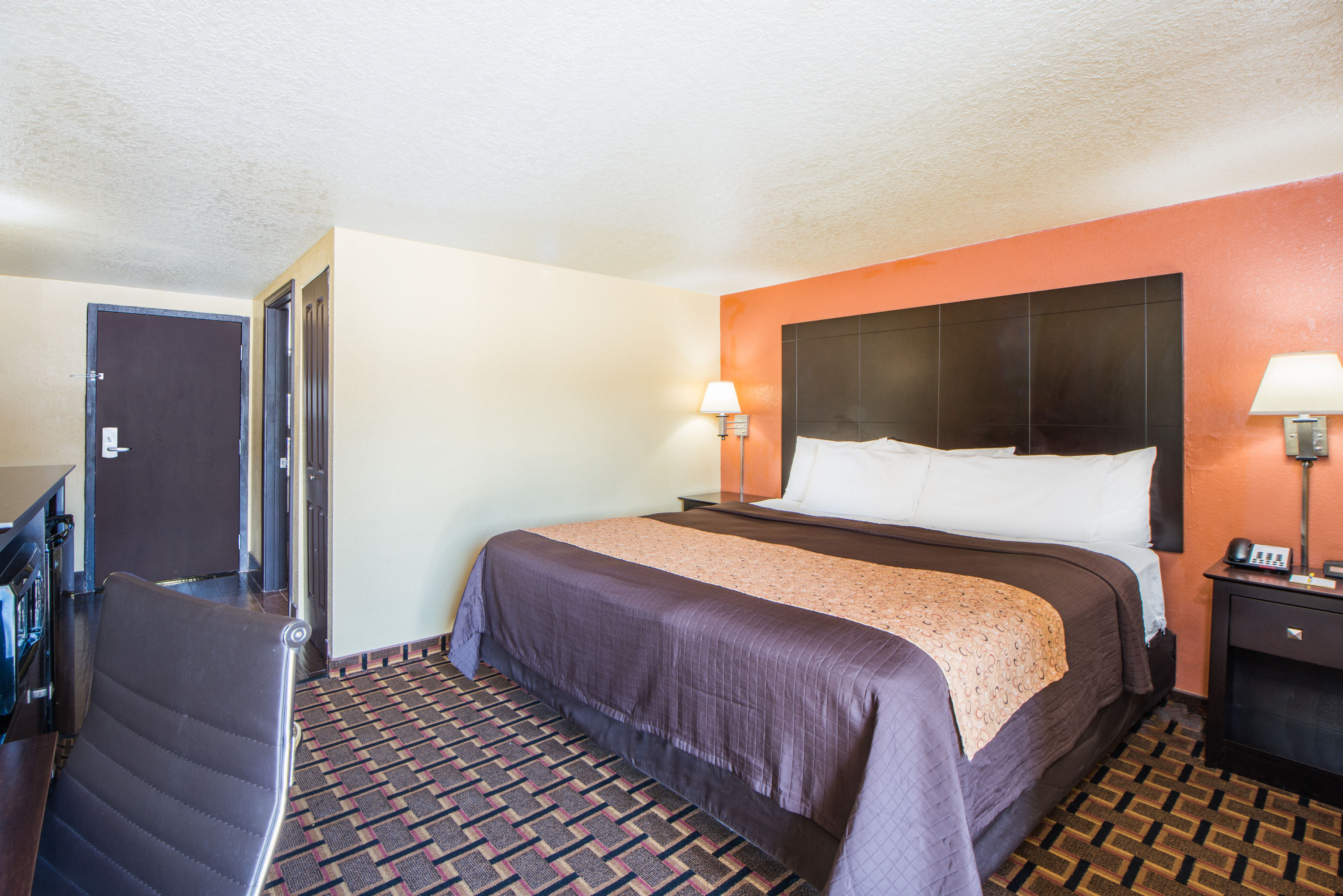 Guest room at the Days Inn by Wyndham Joplin in Joplin, Missouri