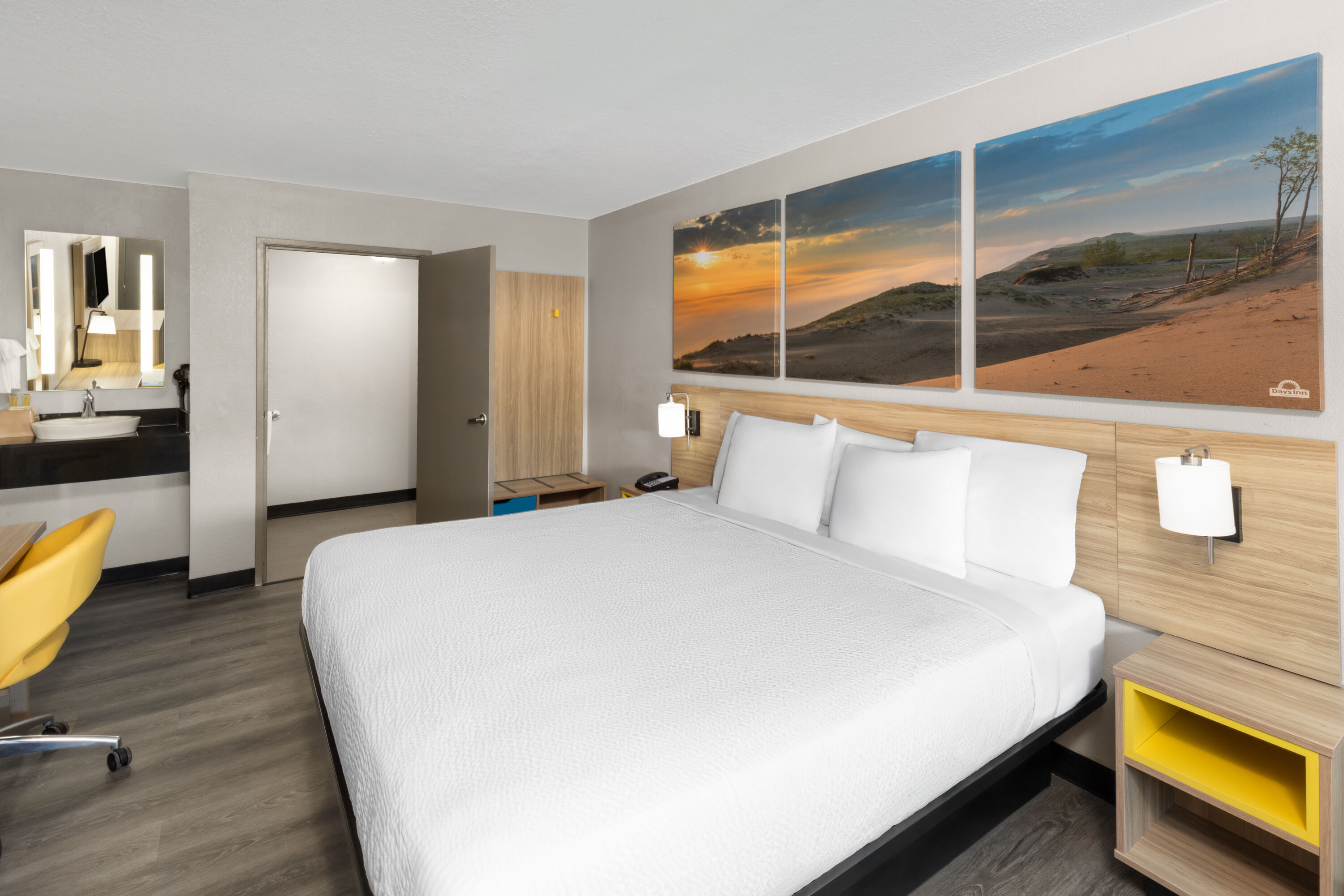 Guest room at the Days Inn by Wyndham Kansas City Northeast in Kansas City, Missouri