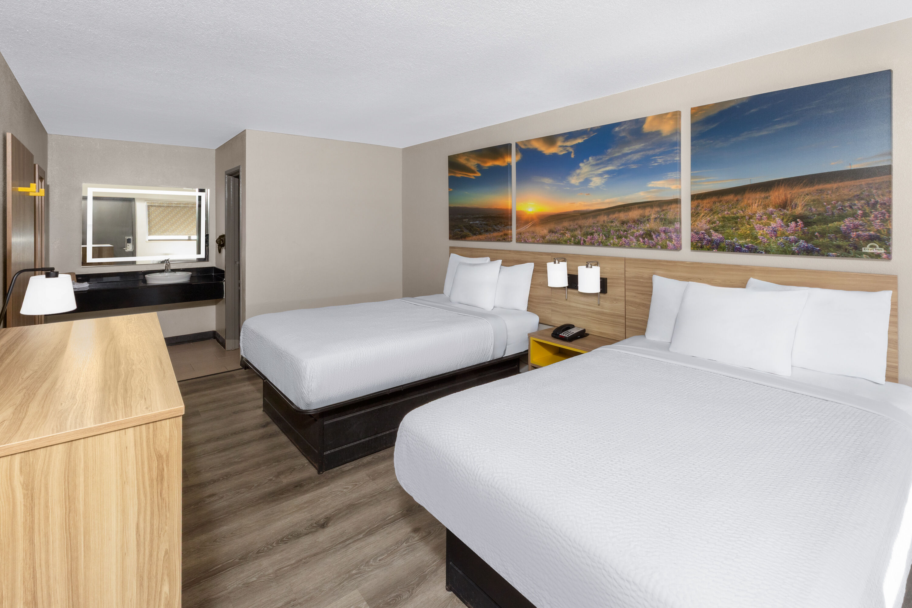 Guest room at the Days Inn by Wyndham Kansas City Northeast in Kansas City, Missouri