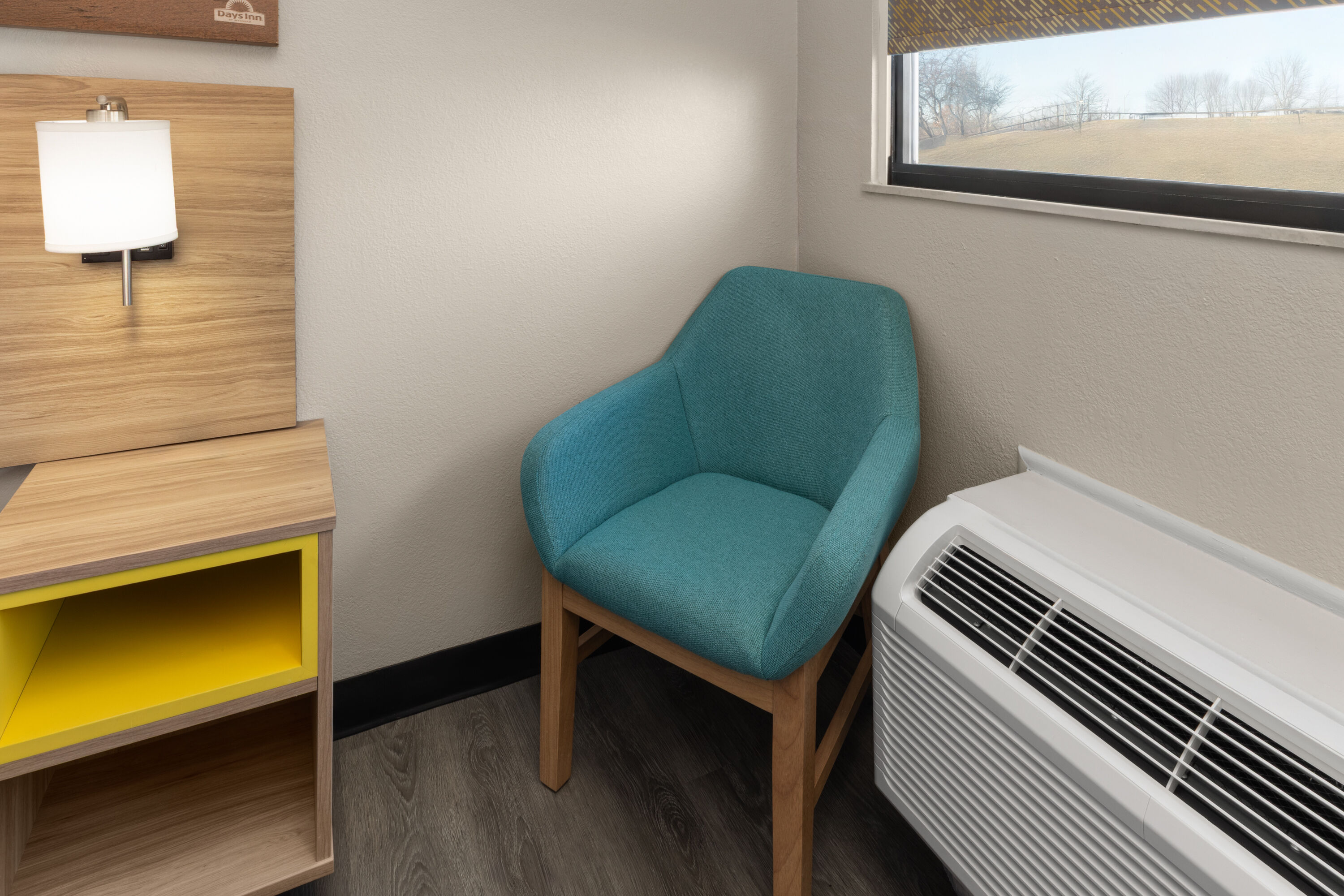 Guest room at the Days Inn by Wyndham Kansas City Northeast in Kansas City, Missouri