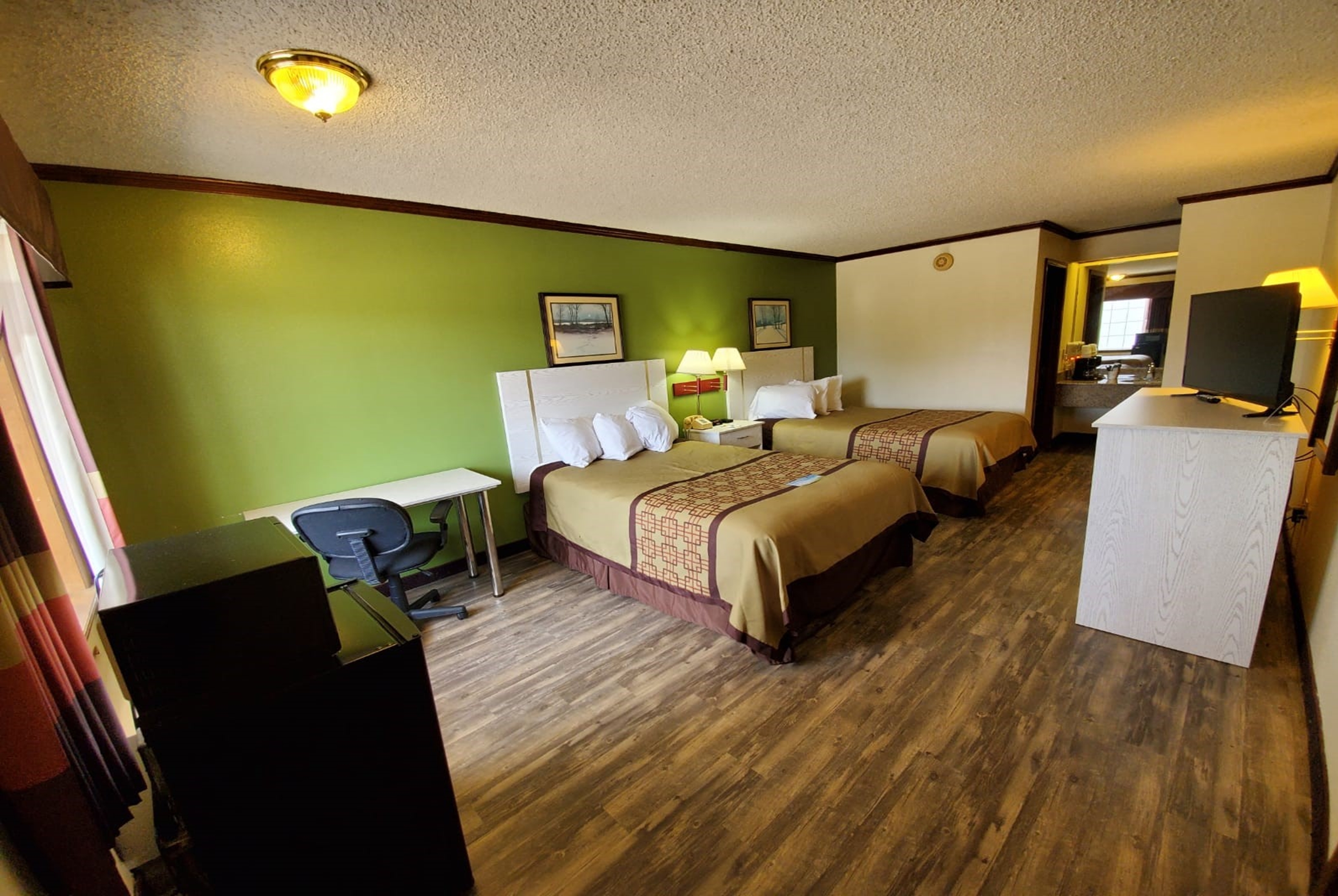 Guest room at the Days Inn by Wyndham Monett in Monett, Missouri