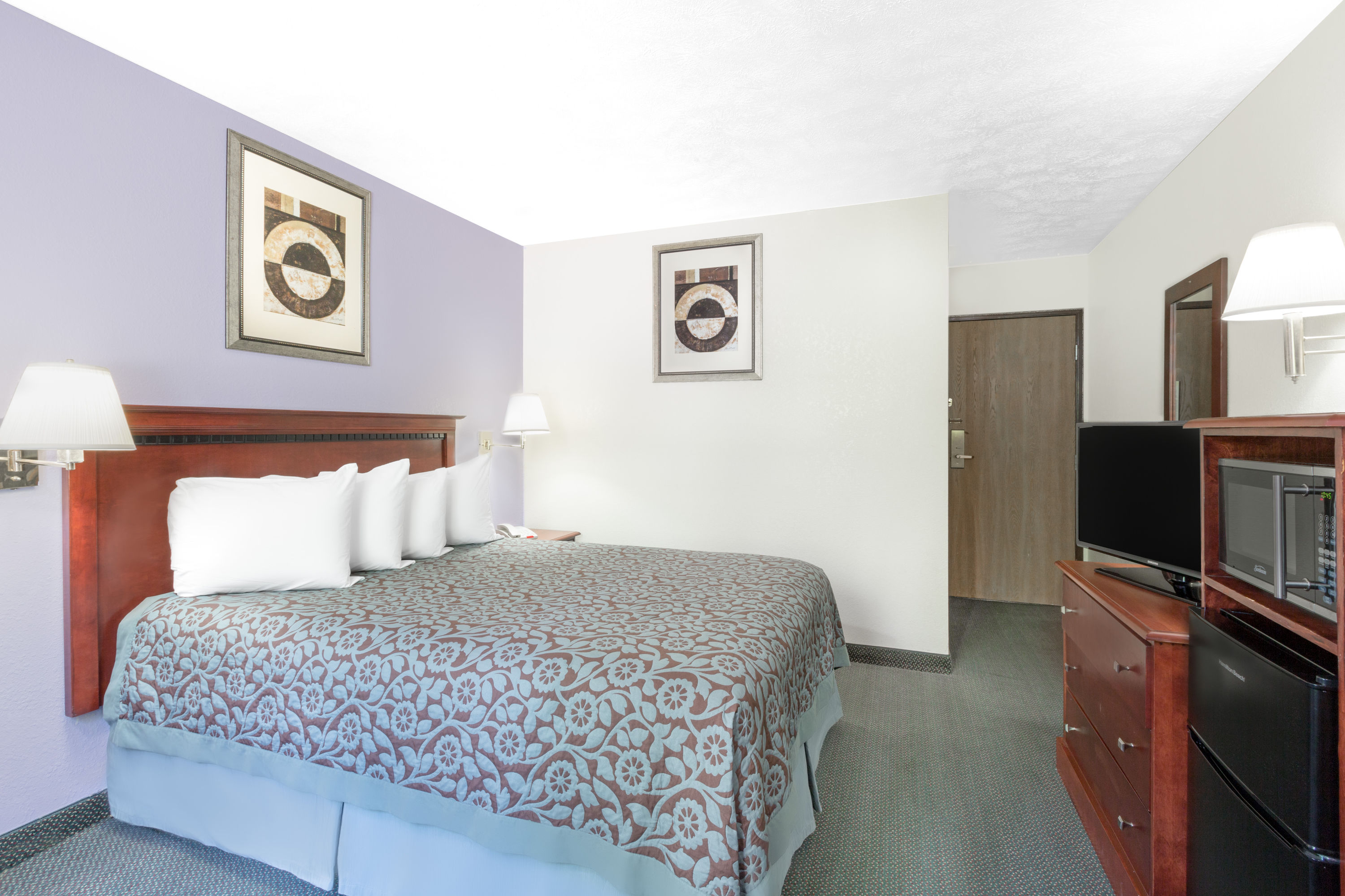 Guest room at the Days Inn by Wyndham Warrensburg in Warrensburg, Missouri