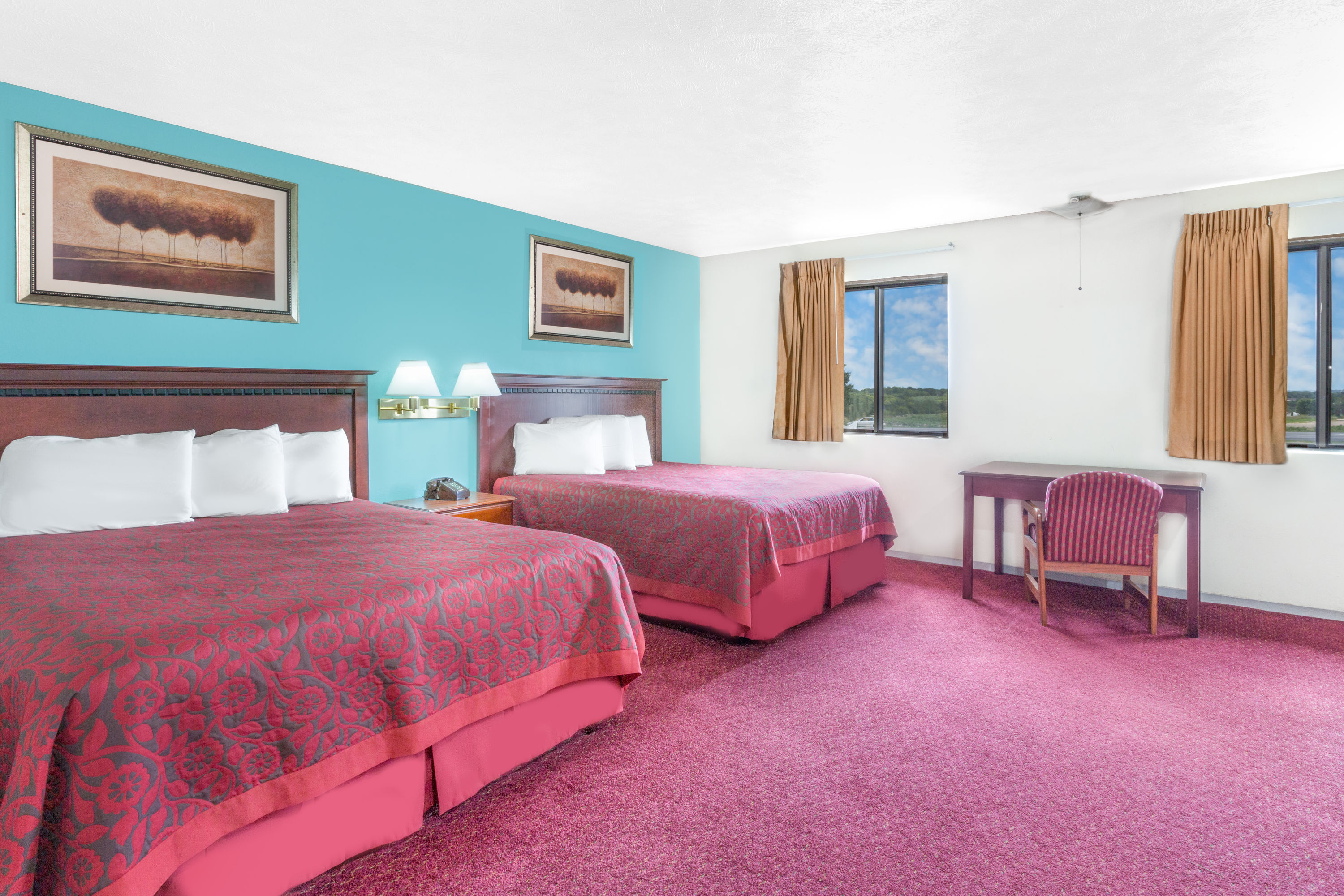 Guest room at the Days Inn by Wyndham Warrensburg in Warrensburg, Missouri