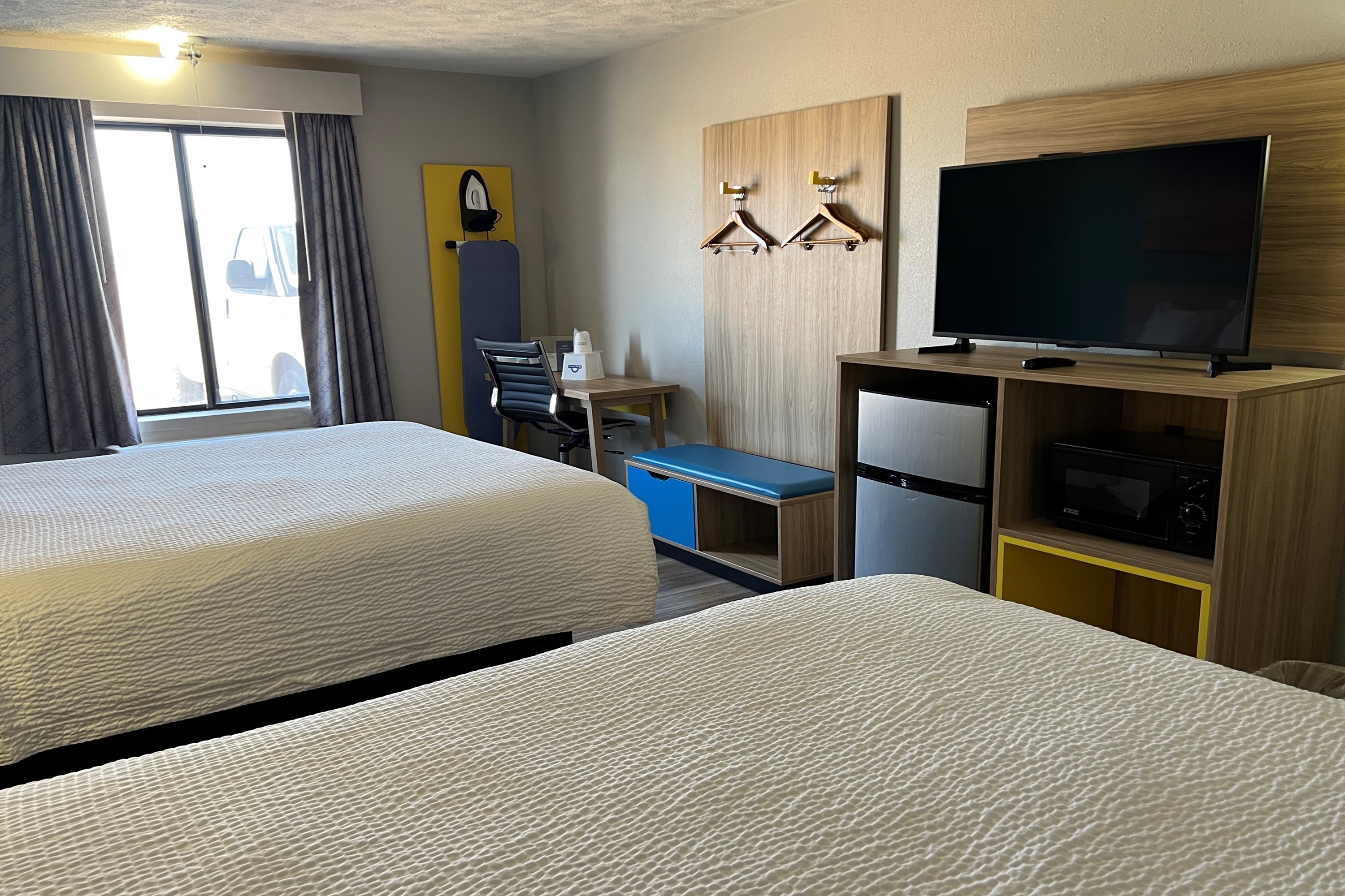 Guest room at the Days Inn by Wyndham Warrensburg in Warrensburg, Missouri