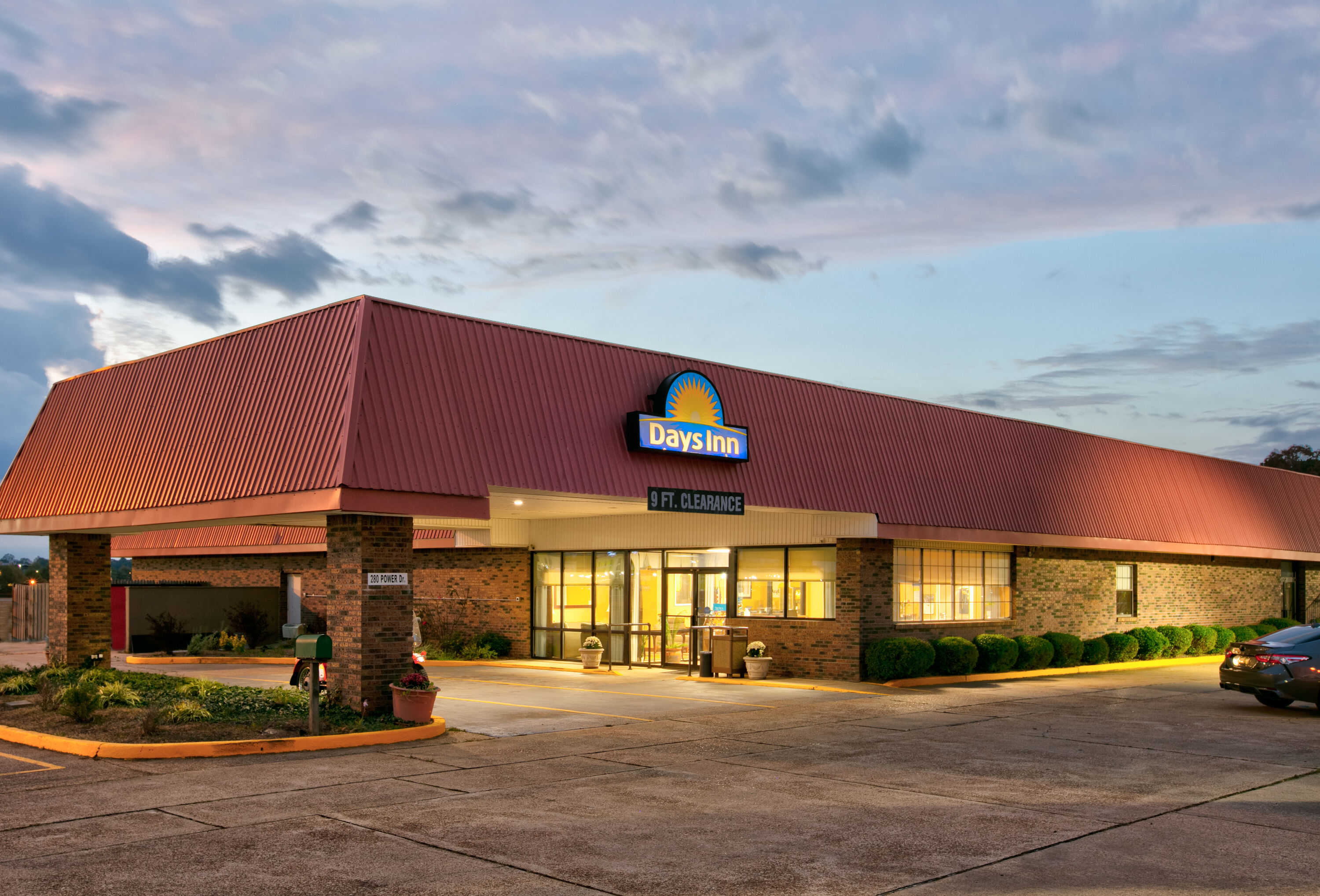 Exterior Dusk Image of Days Inn by Wyndham Batesville hotel in Batesville, Mississippi