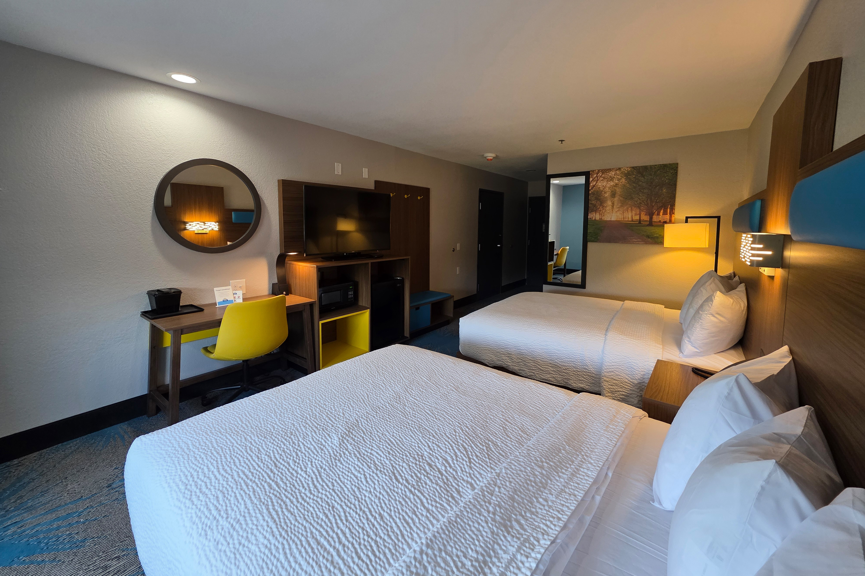 Guest room at the Days Inn & Suites by Wyndham Brandon Amphitheater in Brandon, Mississippi