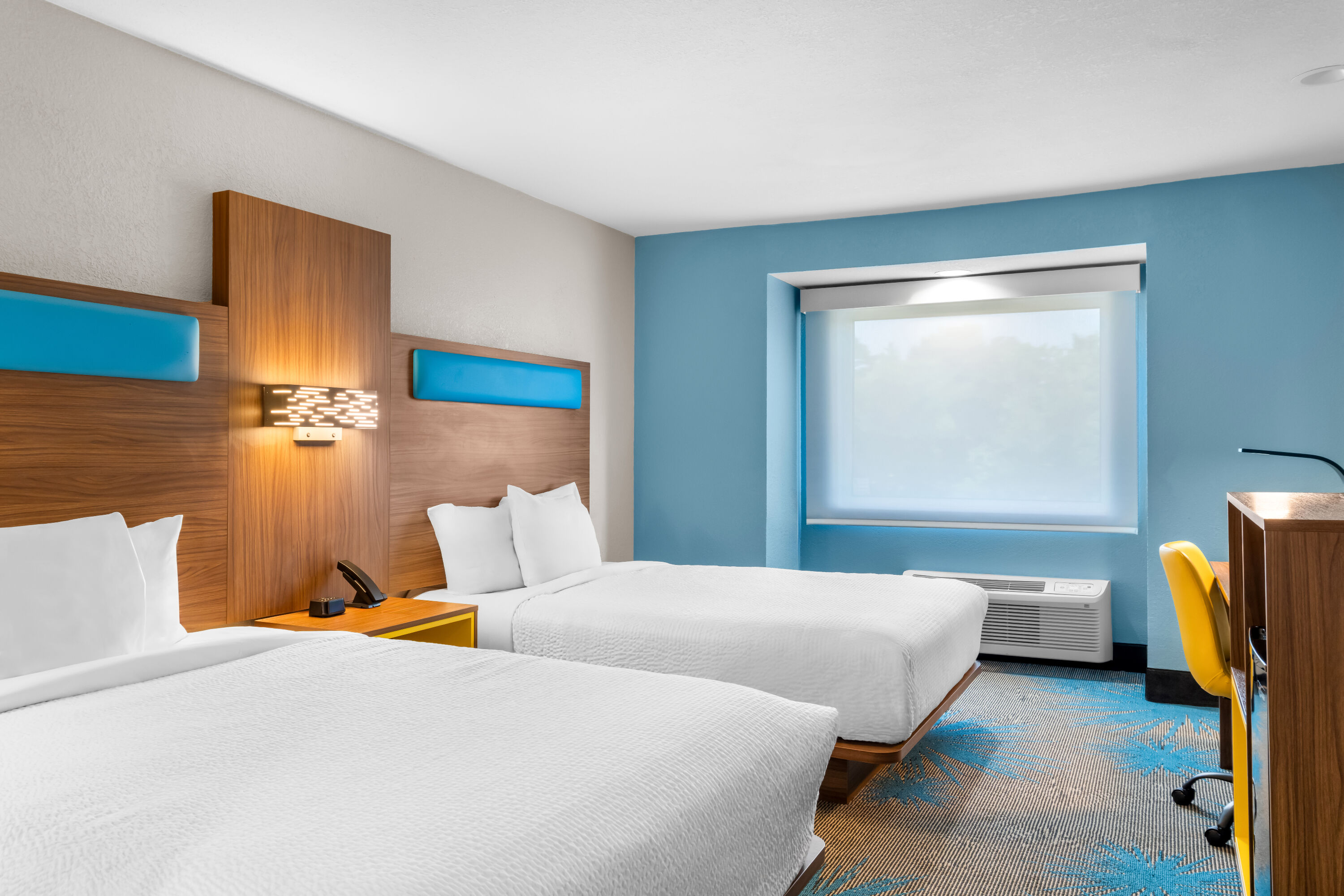 Double bed guest room at the Days Inn & Suites by Wyndham Brandon Amphitheater in Brandon, Mississippi