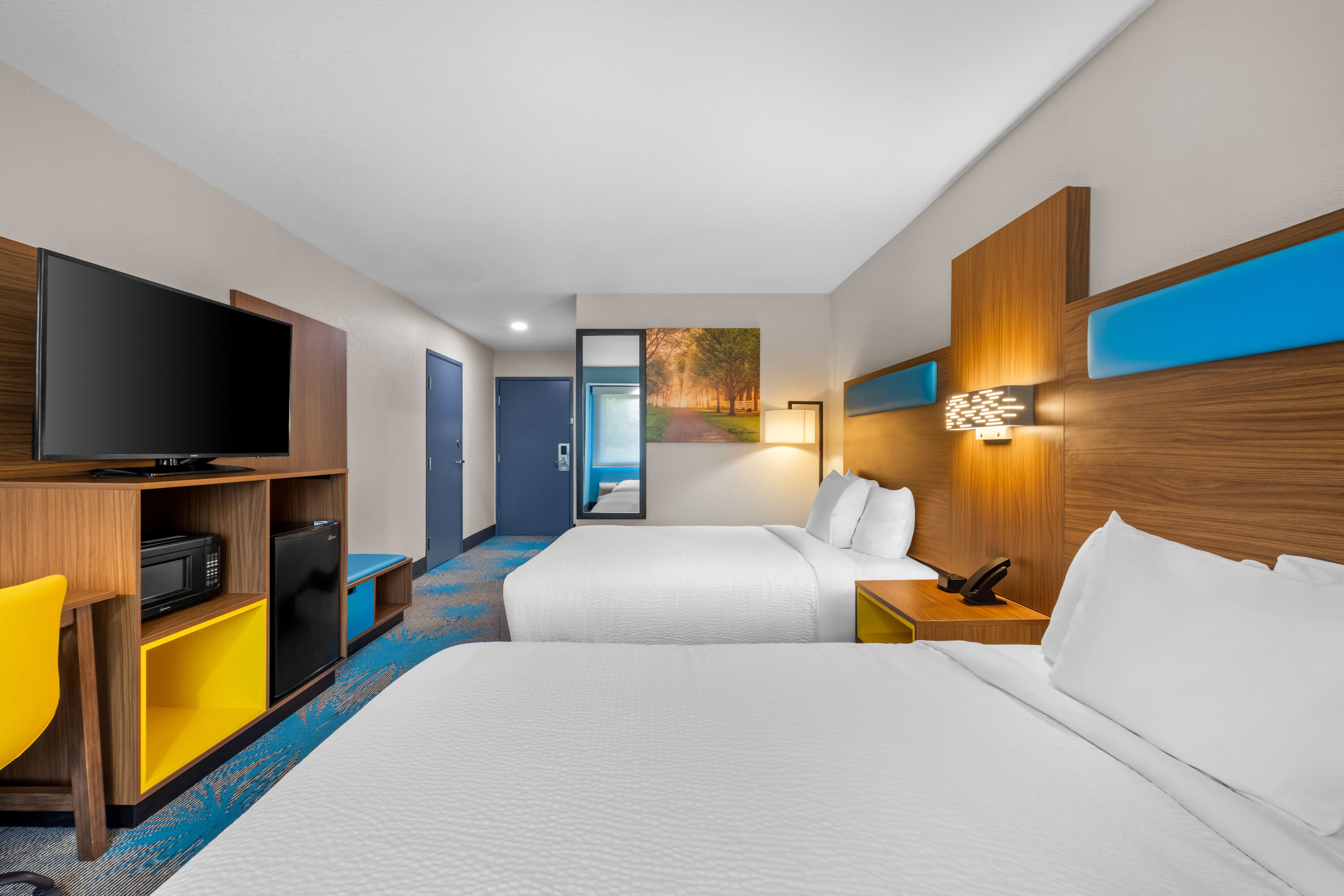 Double bed guest room at the Days Inn & Suites by Wyndham Brandon Amphitheater in Brandon, Mississippi