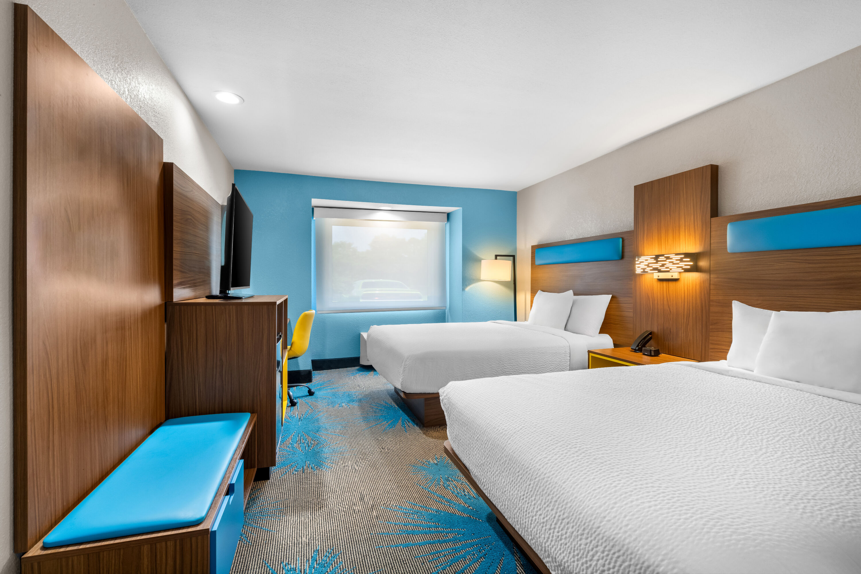 Double bed guest room at the Days Inn & Suites by Wyndham Brandon Amphitheater in Brandon, Mississippi
