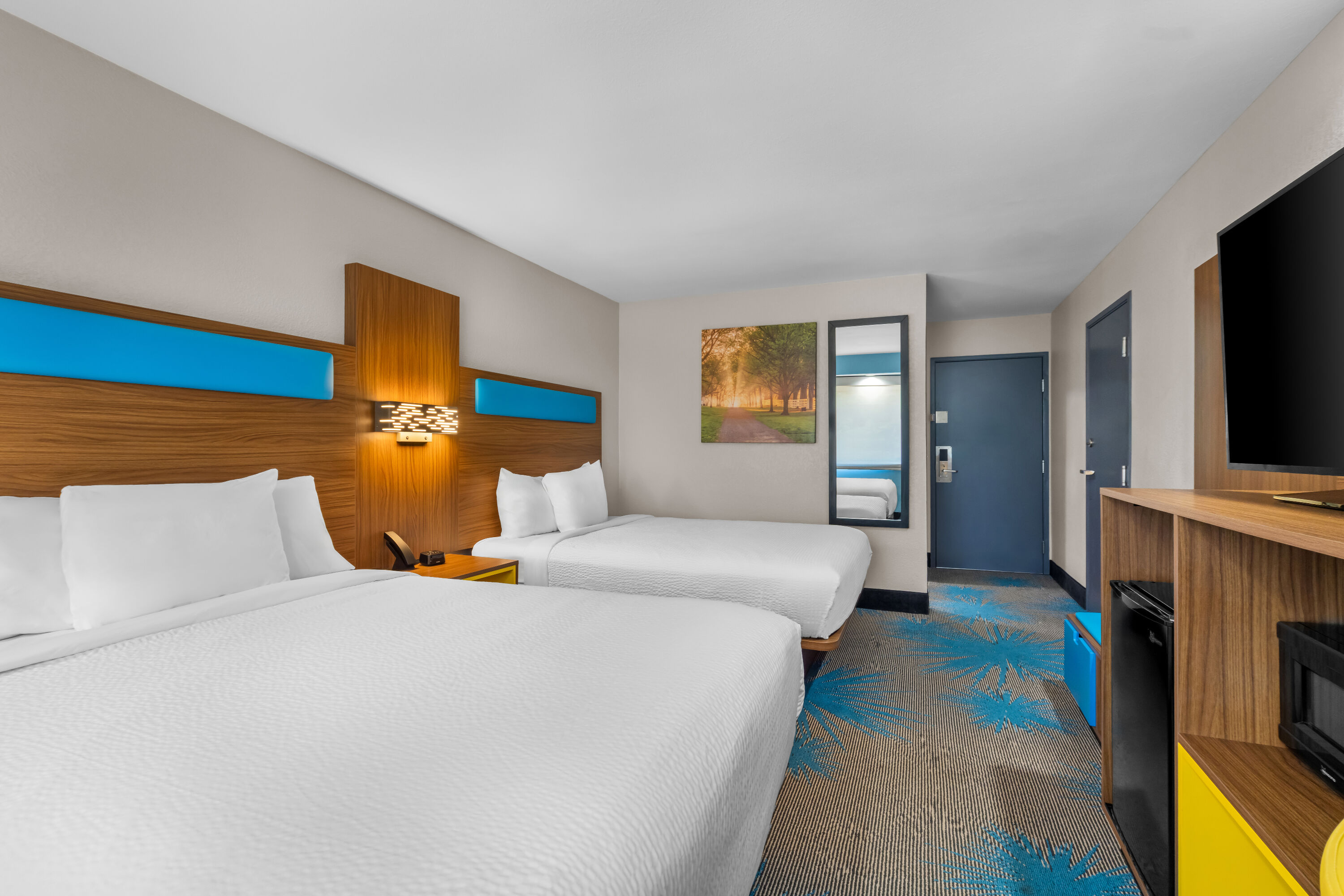 Double bed guest room at the Days Inn & Suites by Wyndham Brandon Amphitheater in Brandon, Mississippi