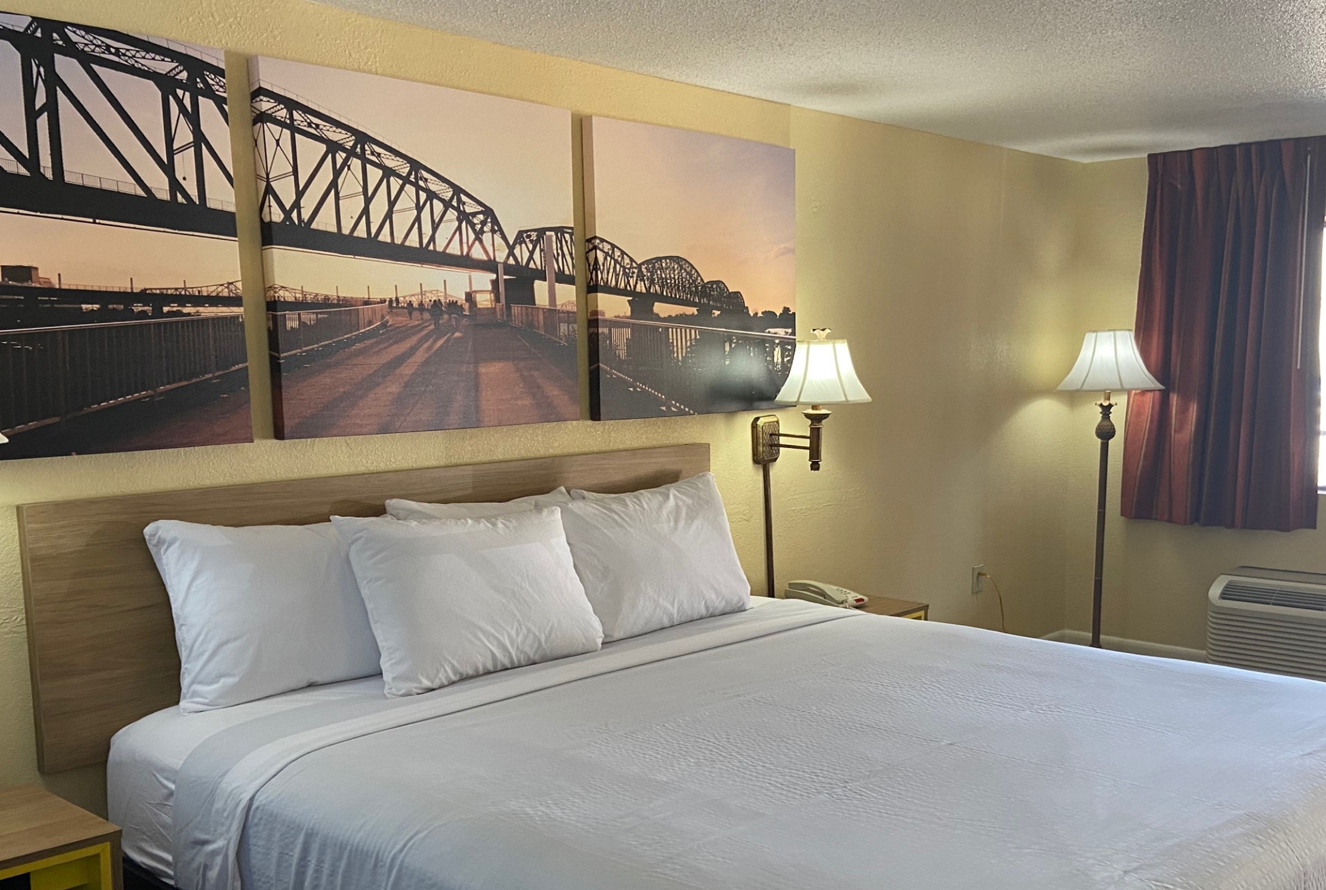 Guest room at the Days Inn by Wyndham Clinton in Clinton, Mississippi
