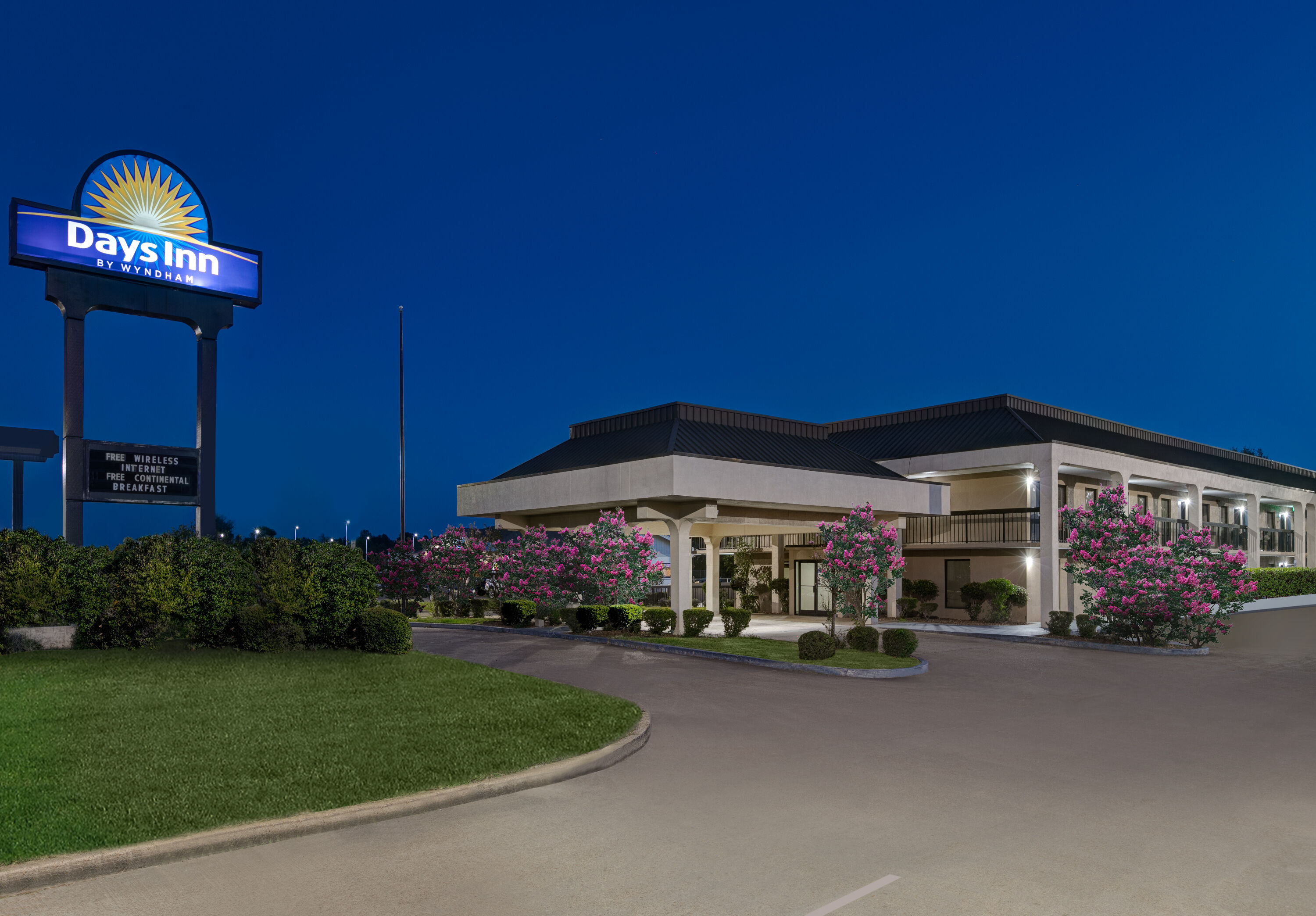 Exterior Dusk Image of Days Inn by Wyndham Greenville MS hotel in Greenville, Mississippi