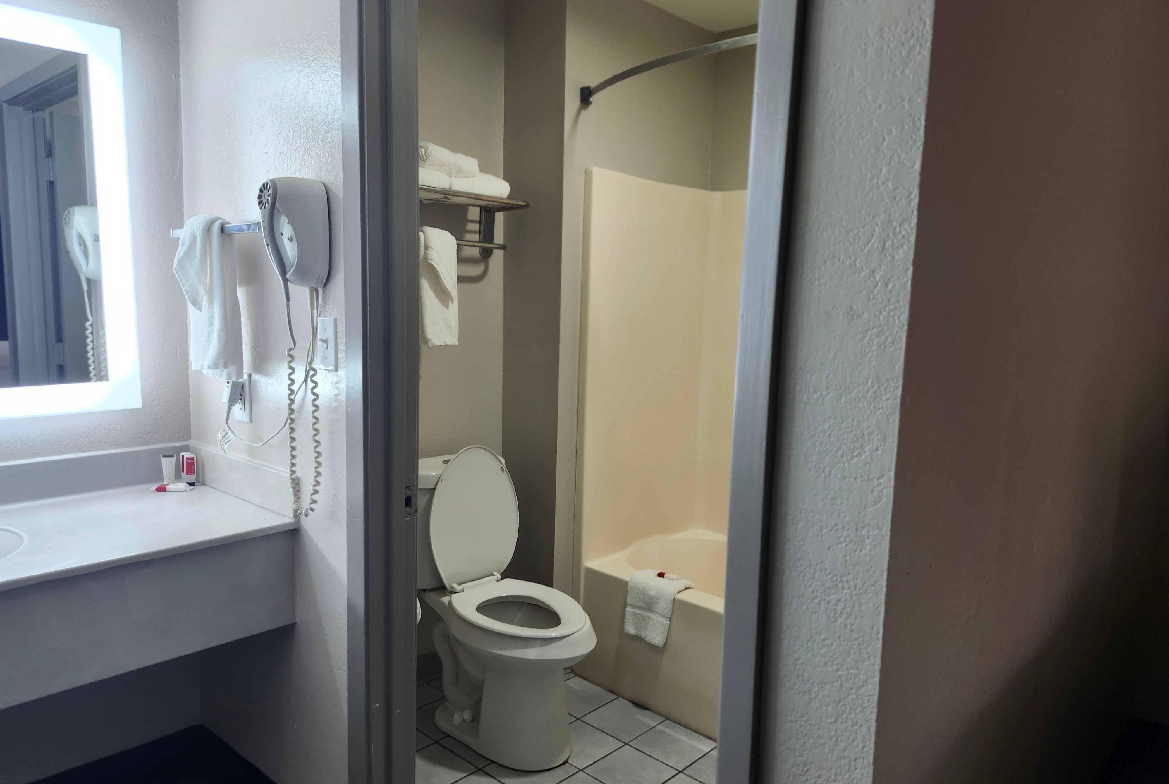 Guest room bath at the Days Inn by Wyndham Ocean Springs in Ocean Springs, Mississippi