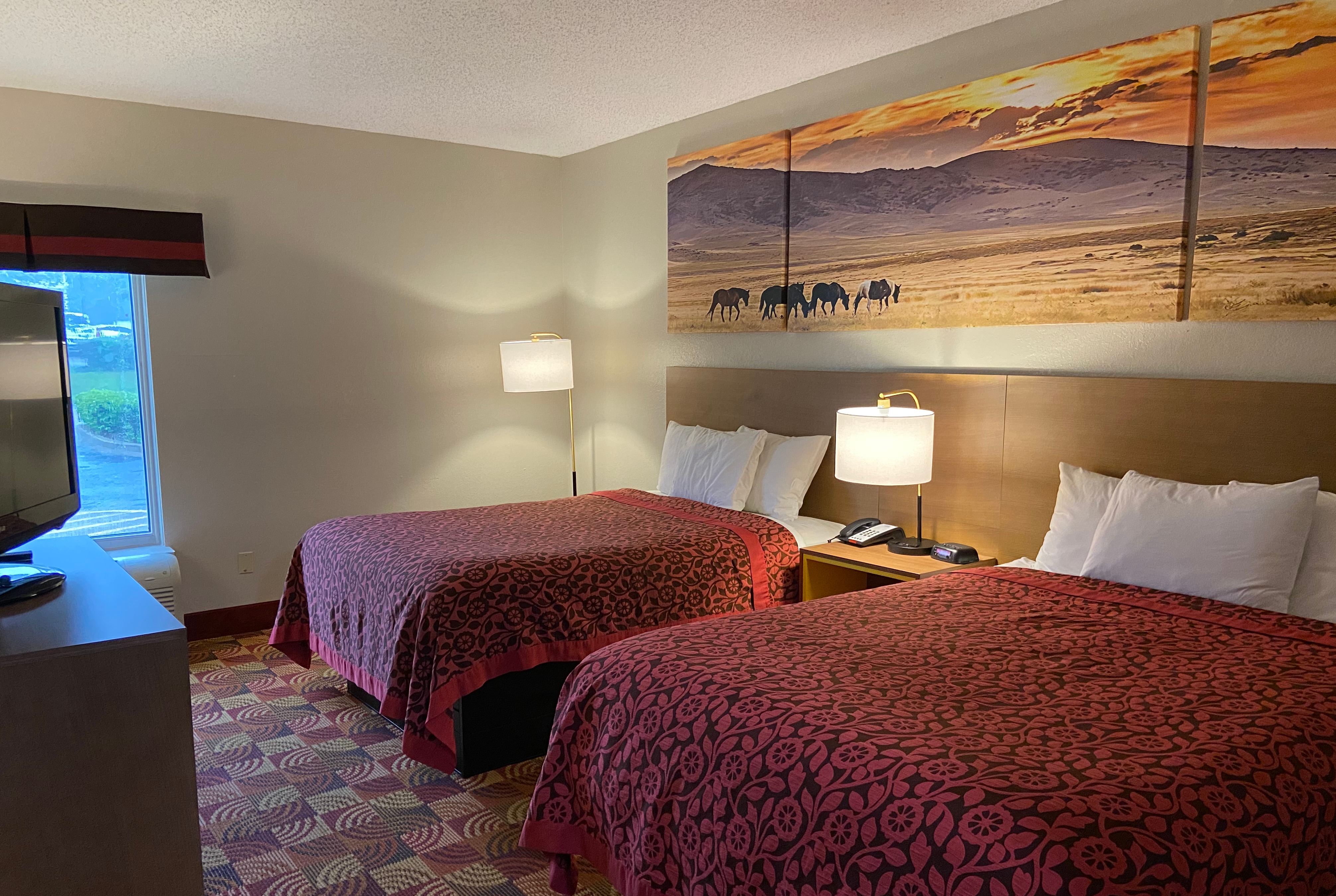 Guest room at the Days Inn & Suites by Wyndham Ridgeland in Ridgeland, Mississippi