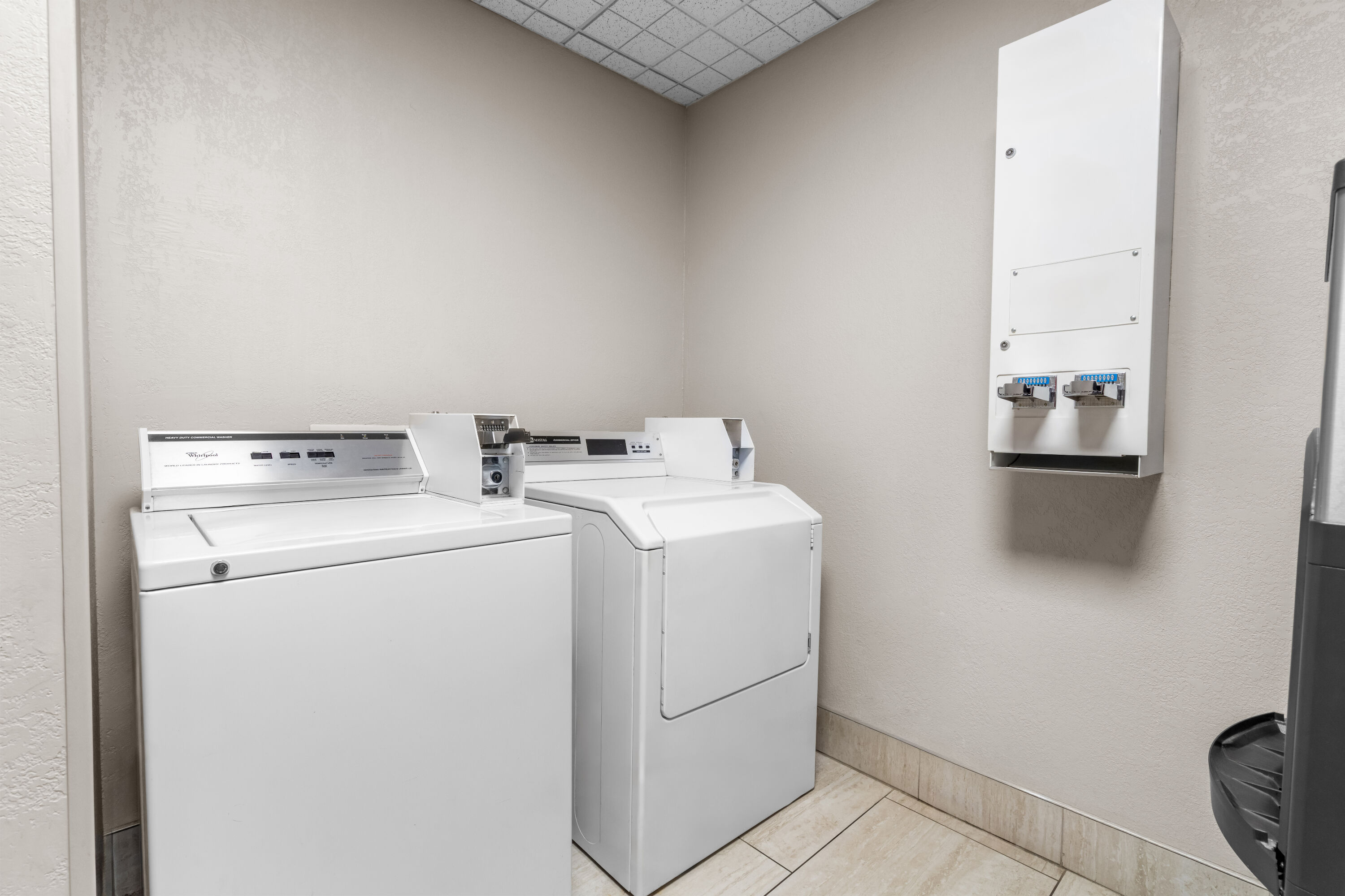 Laundry facilities at Days Inn & Suites by Wyndham Ridgeland in Ridgeland, Mississippi