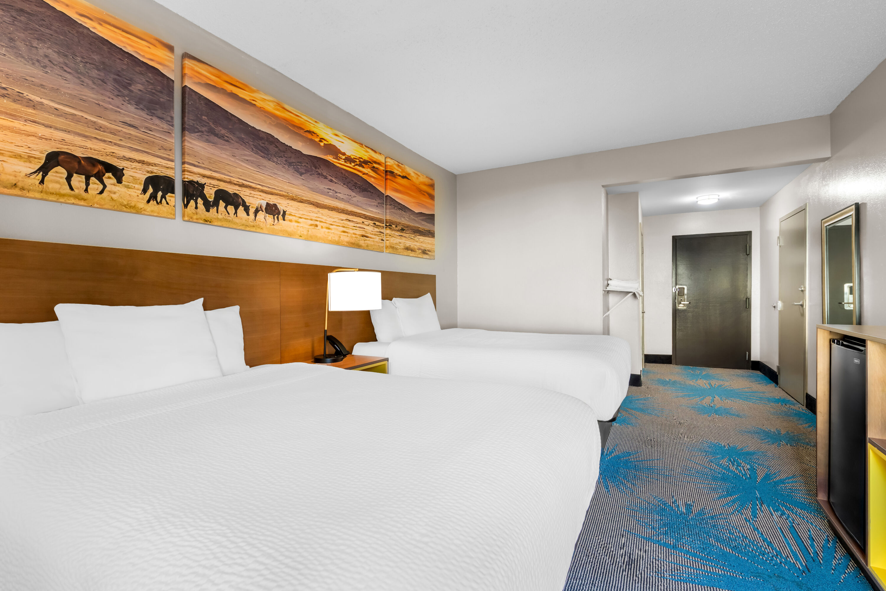 Double bed guest room at the Days Inn & Suites by Wyndham Ridgeland in Ridgeland, Mississippi