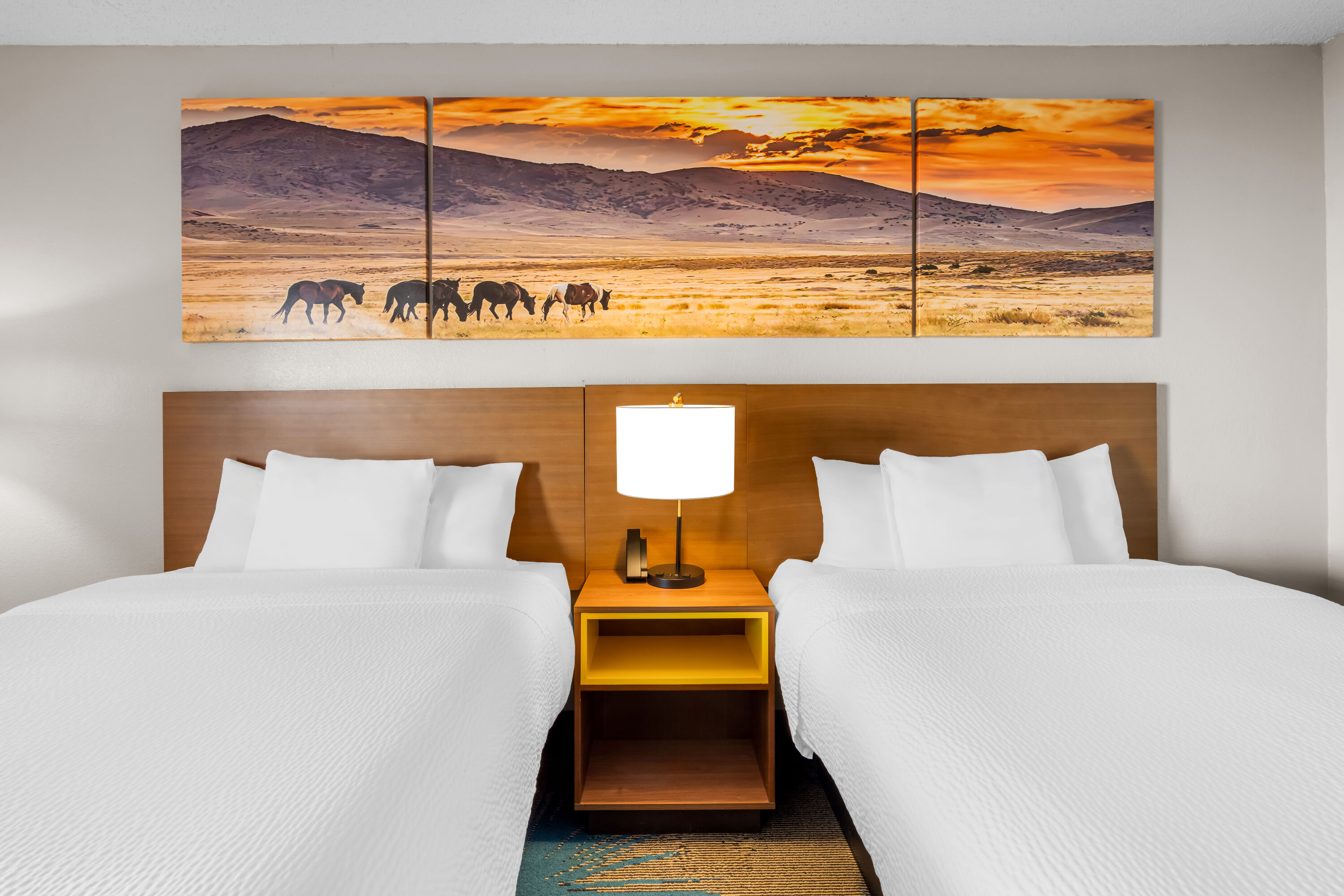 Double bed guest room at the Days Inn & Suites by Wyndham Ridgeland in Ridgeland, Mississippi