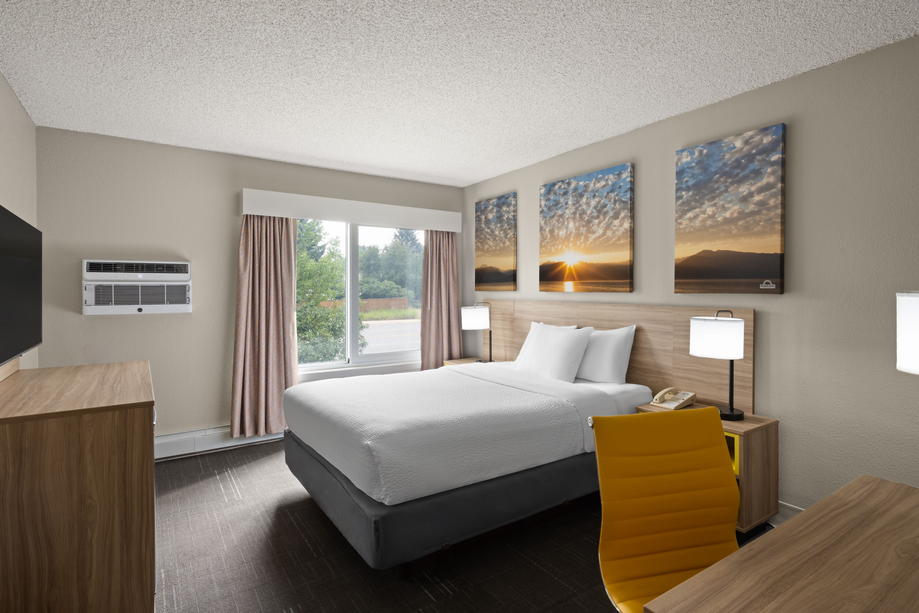Guest room at the Days Inn & Suites by Wyndham Bozeman in Bozeman, Montana