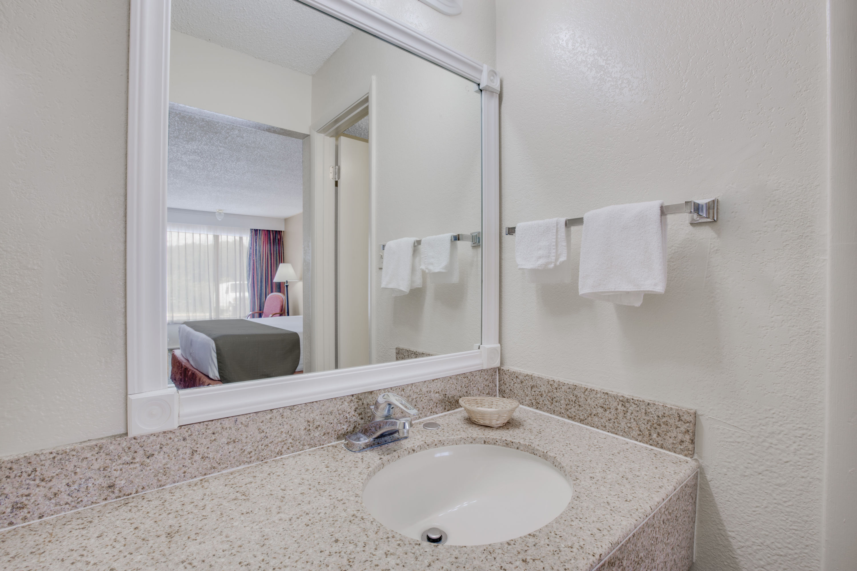 Guest room bath at the Days Inn by Wyndham Asheville West in Candler, North Carolina