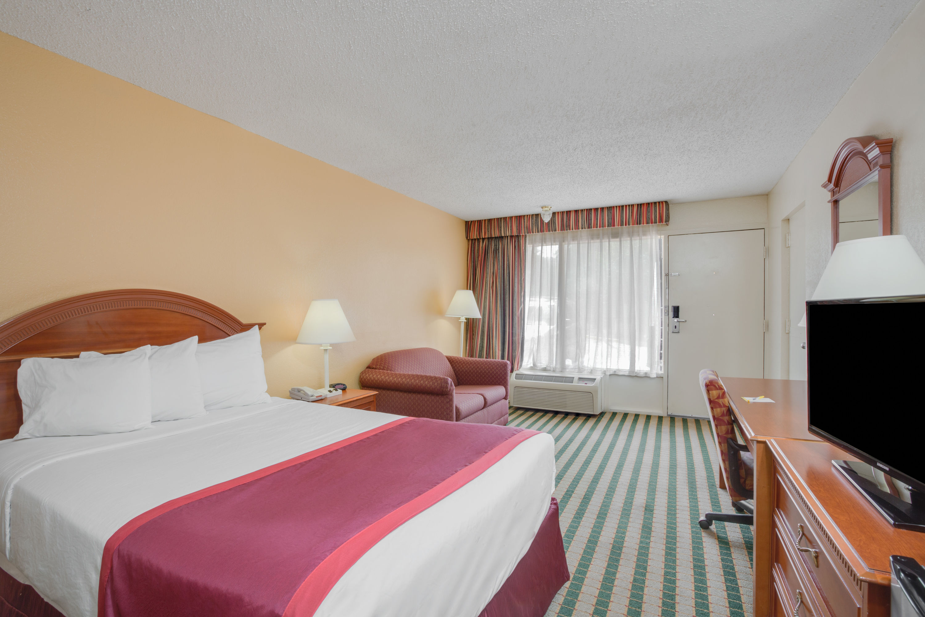Guest room at the Days Inn by Wyndham Asheville West in Candler, North Carolina