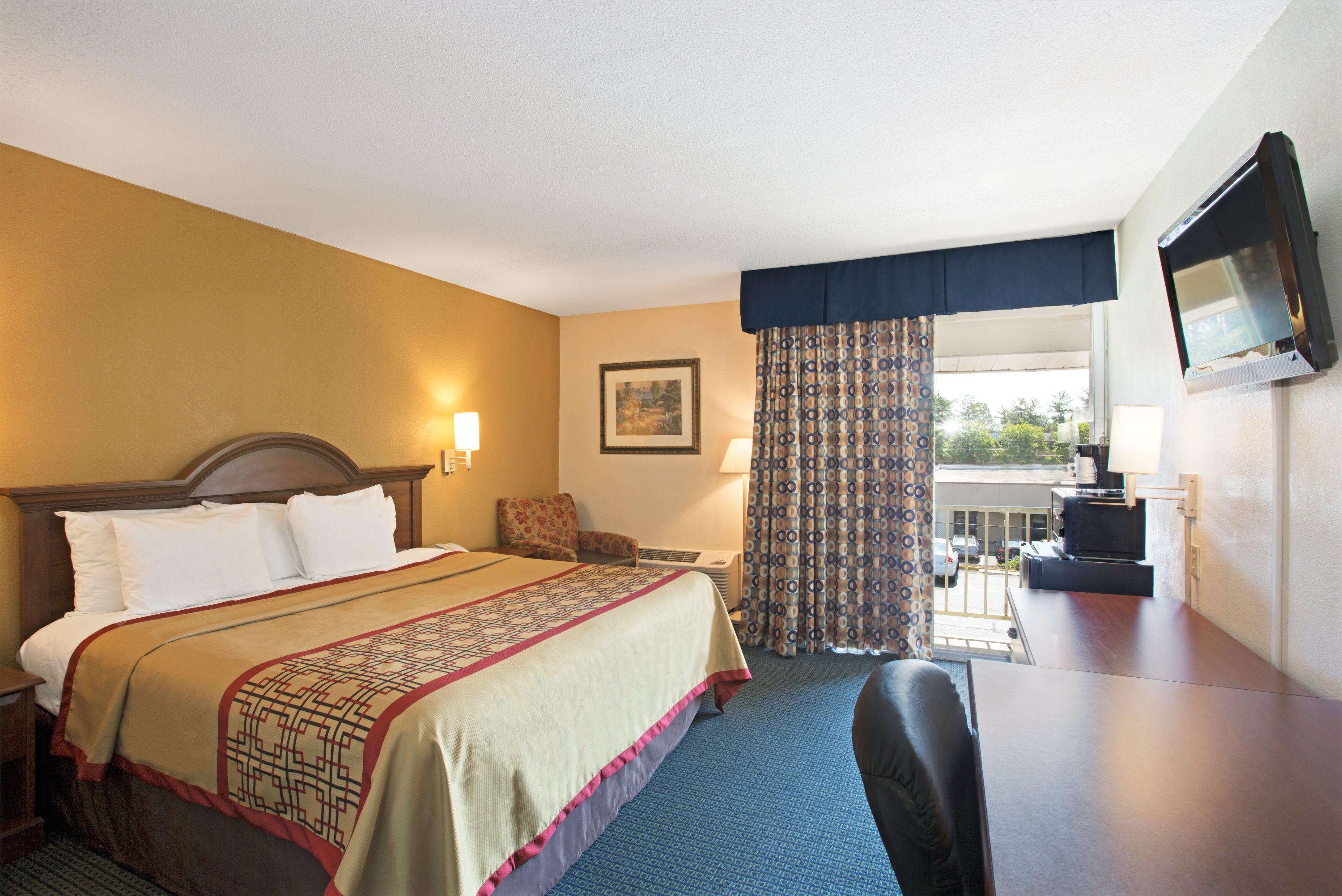 Guest room at the Days Inn by Wyndham Charlotte/Woodlawn Near Carowinds in Charlotte, North Carolina