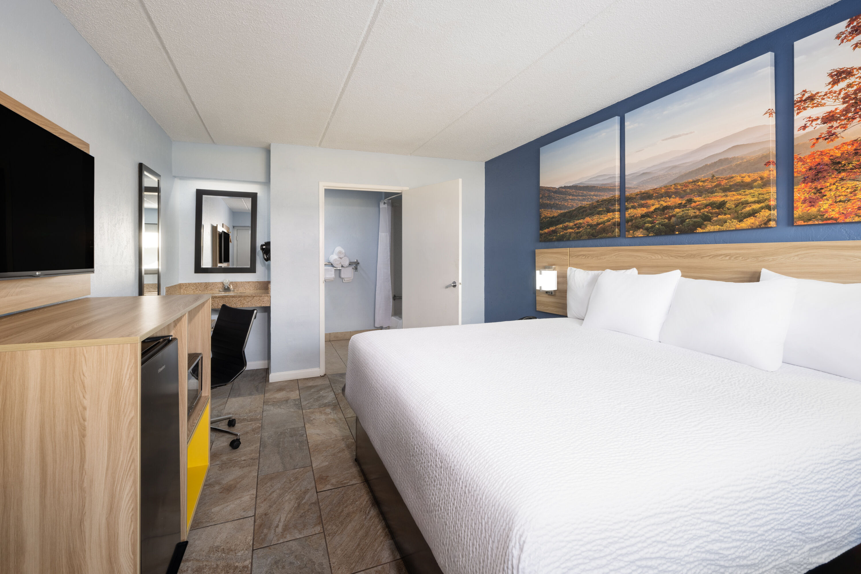 Guest room at the Days Inn by Wyndham Charlotte University in Charlotte, North Carolina