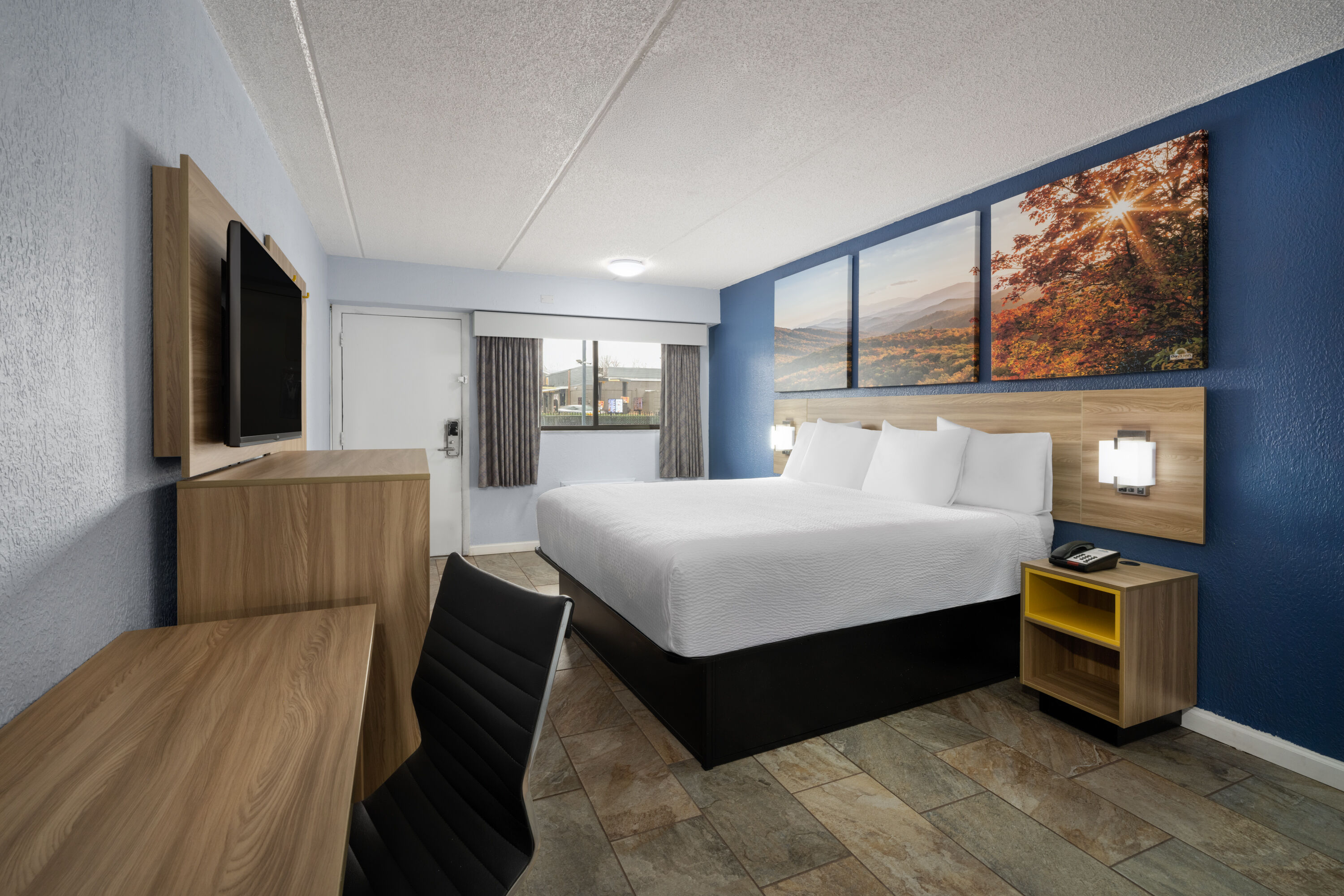 Guest room at the Days Inn by Wyndham Charlotte University in Charlotte, North Carolina