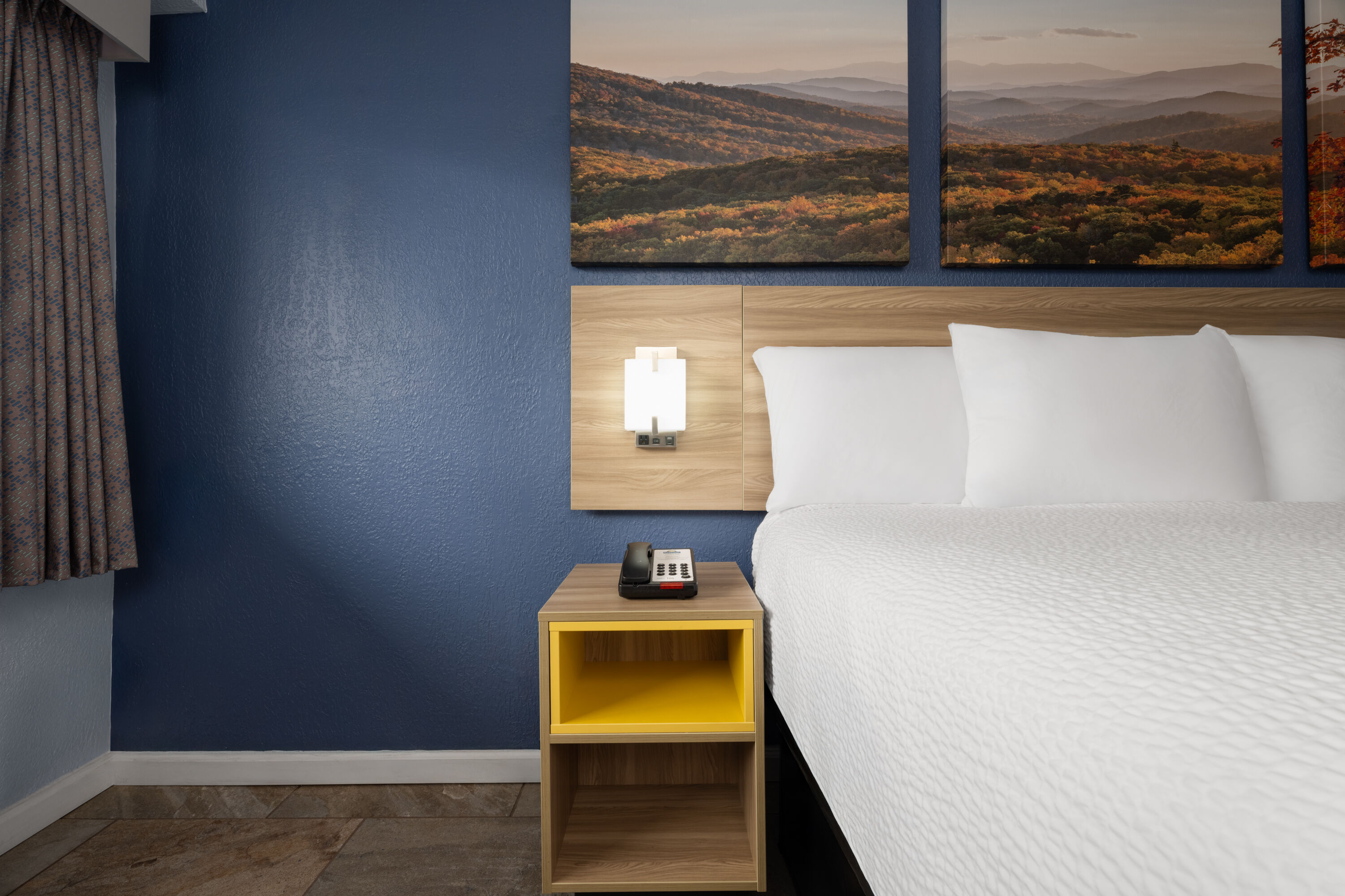 Guest room at the Days Inn by Wyndham Charlotte University in Charlotte, North Carolina