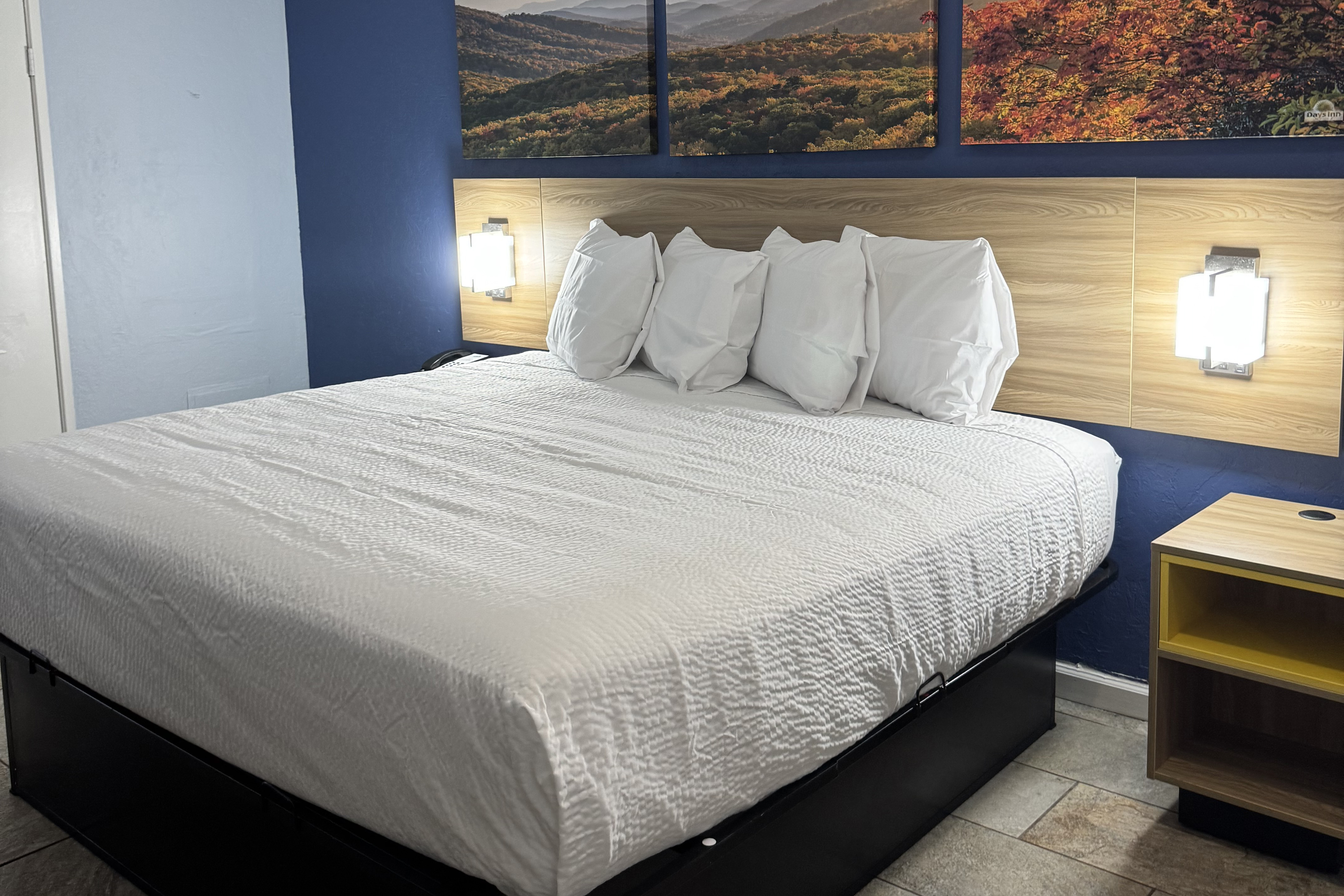 Guest room at the Days Inn by Wyndham Charlotte University in Charlotte, North Carolina