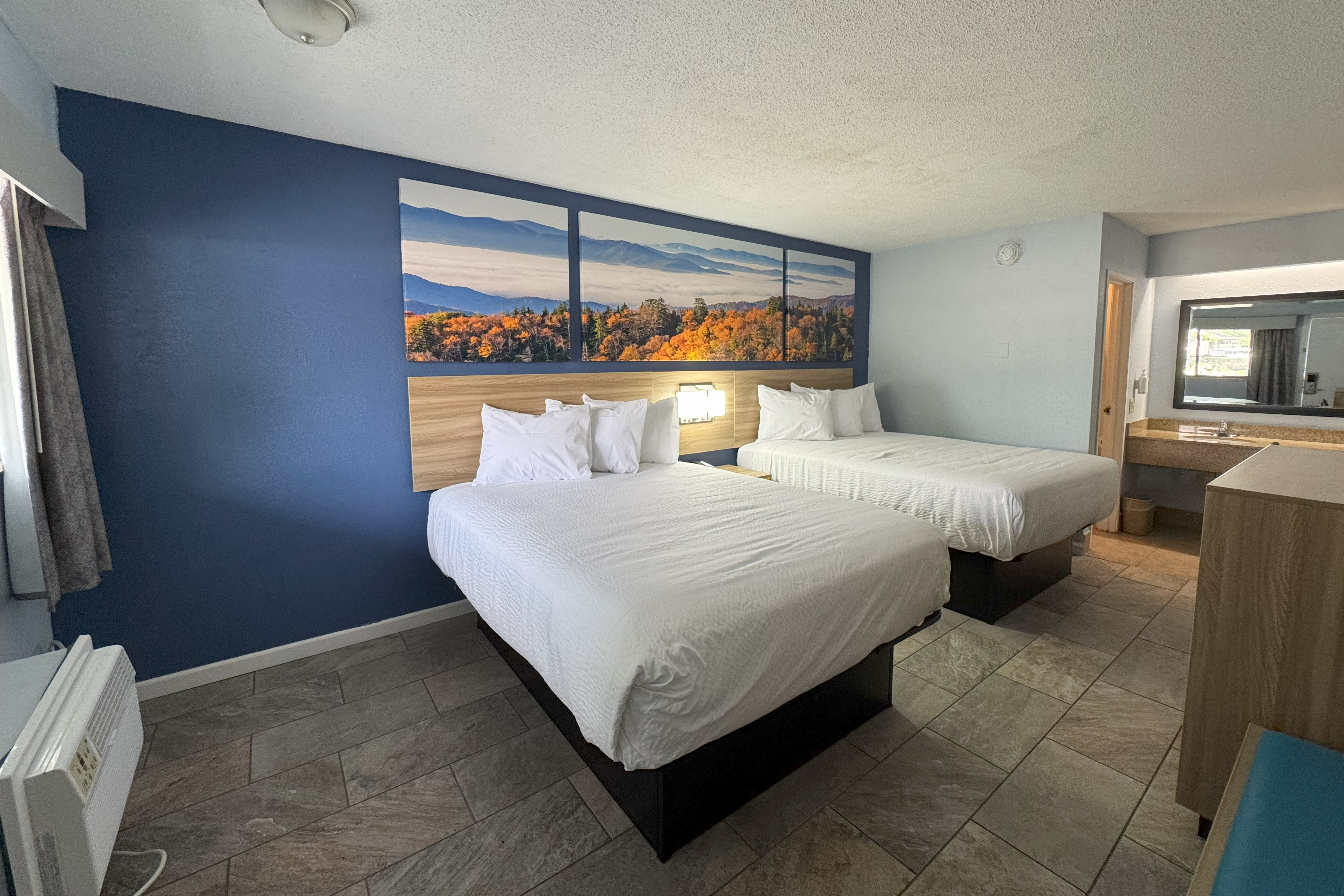 Guest room at the Days Inn by Wyndham Charlotte University in Charlotte, North Carolina