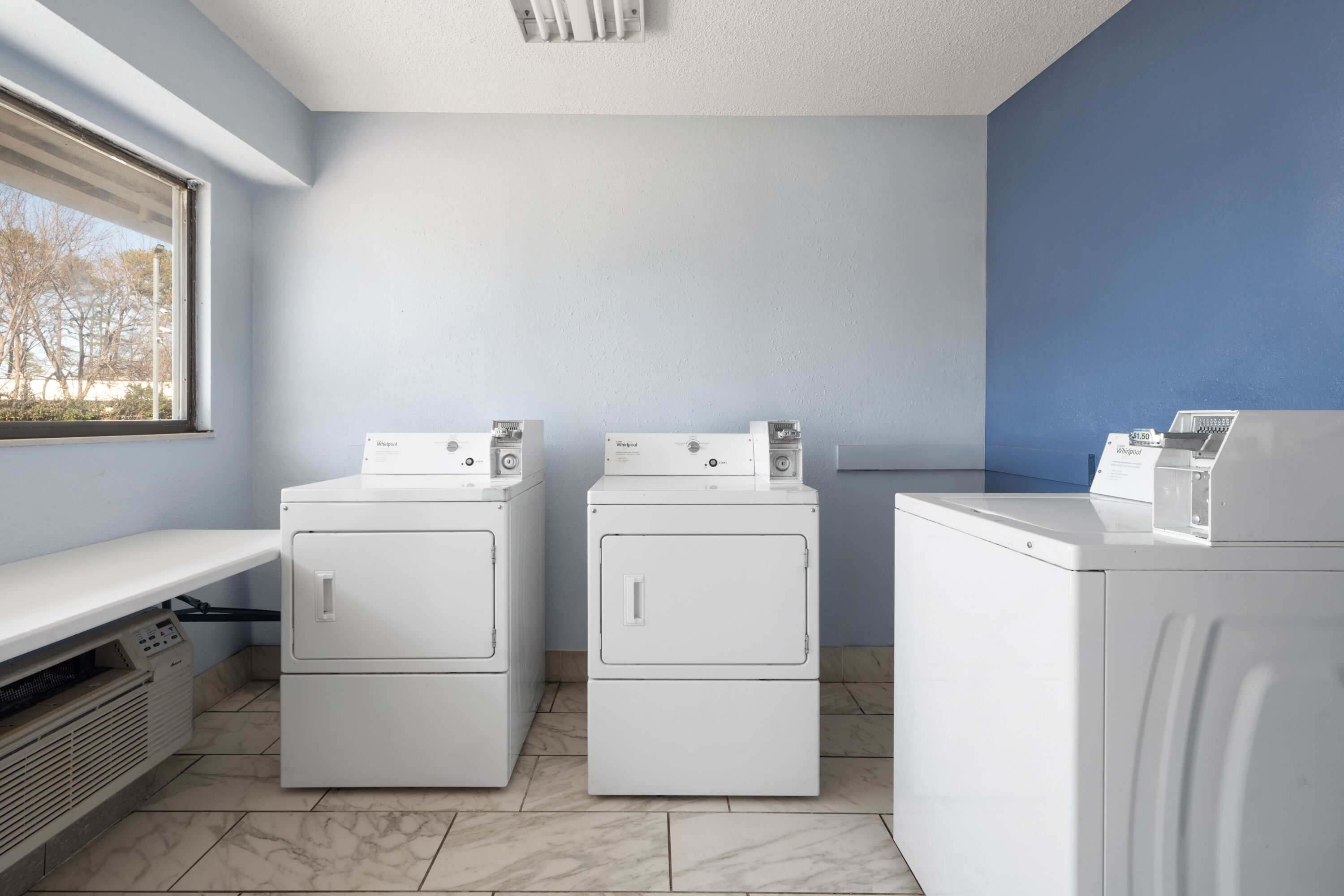 Laundry facilities at Days Inn by Wyndham Charlotte University in Charlotte, North Carolina