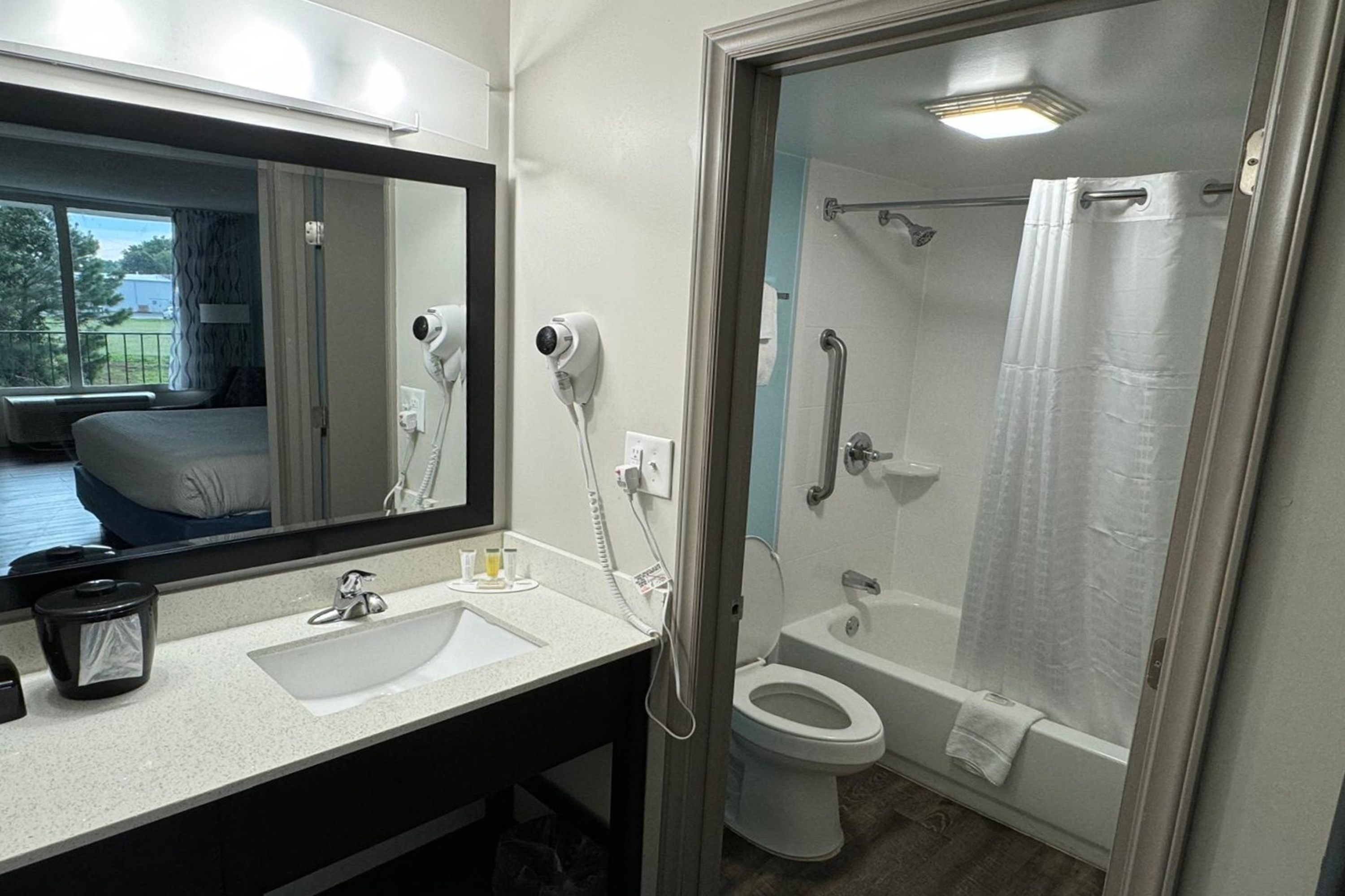 Guest room bath at the Days Inn by Wyndham Goldsboro in Goldsboro, North Carolina