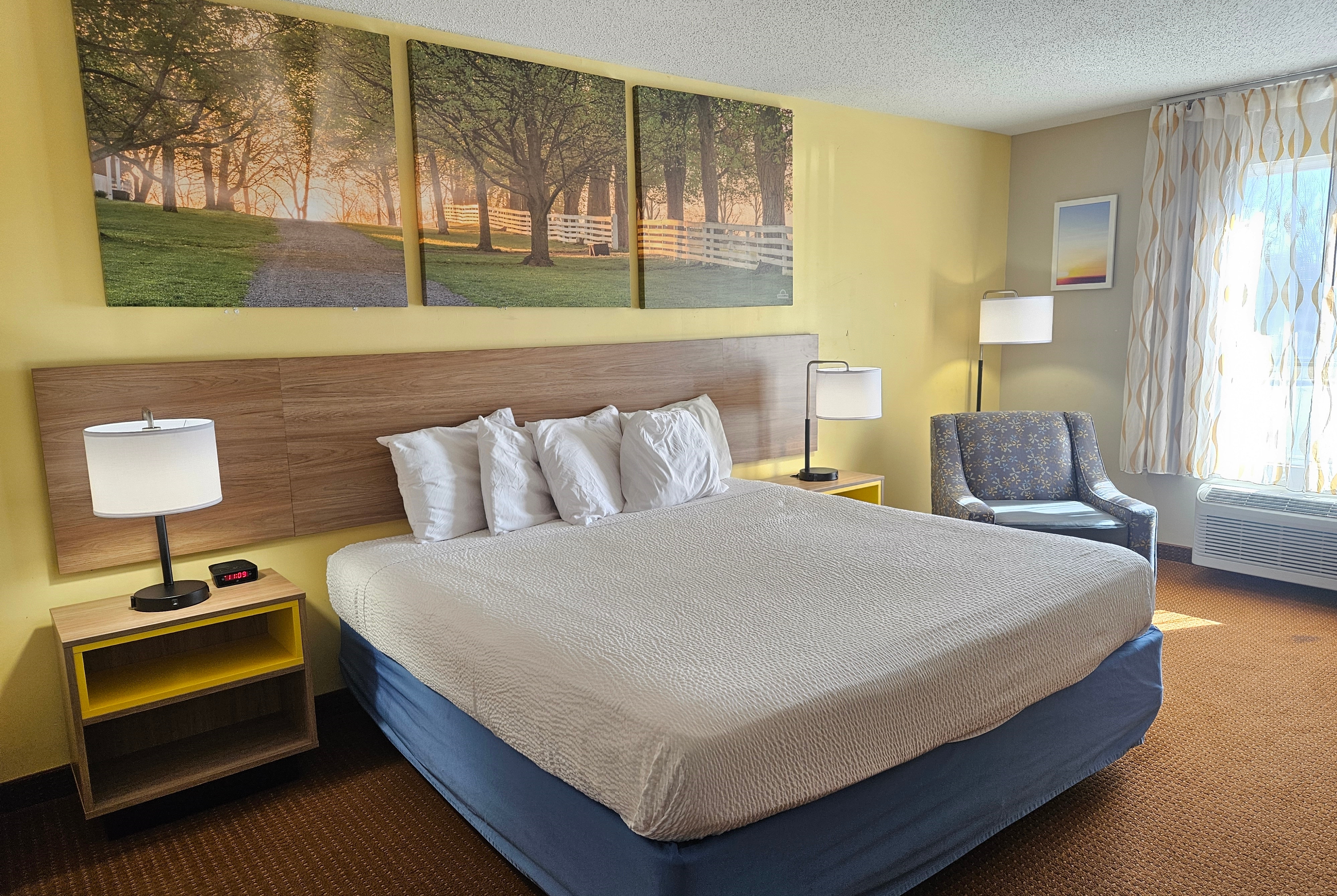 Guest room at the Days Inn by Wyndham Greensboro NC in Greensboro, North Carolina