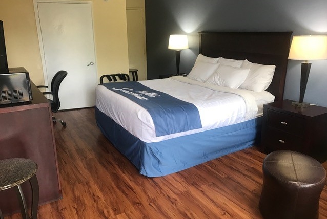 King bed guest room at the Days Inn by Wyndham King/Winston Salem Area in King, North Carolina