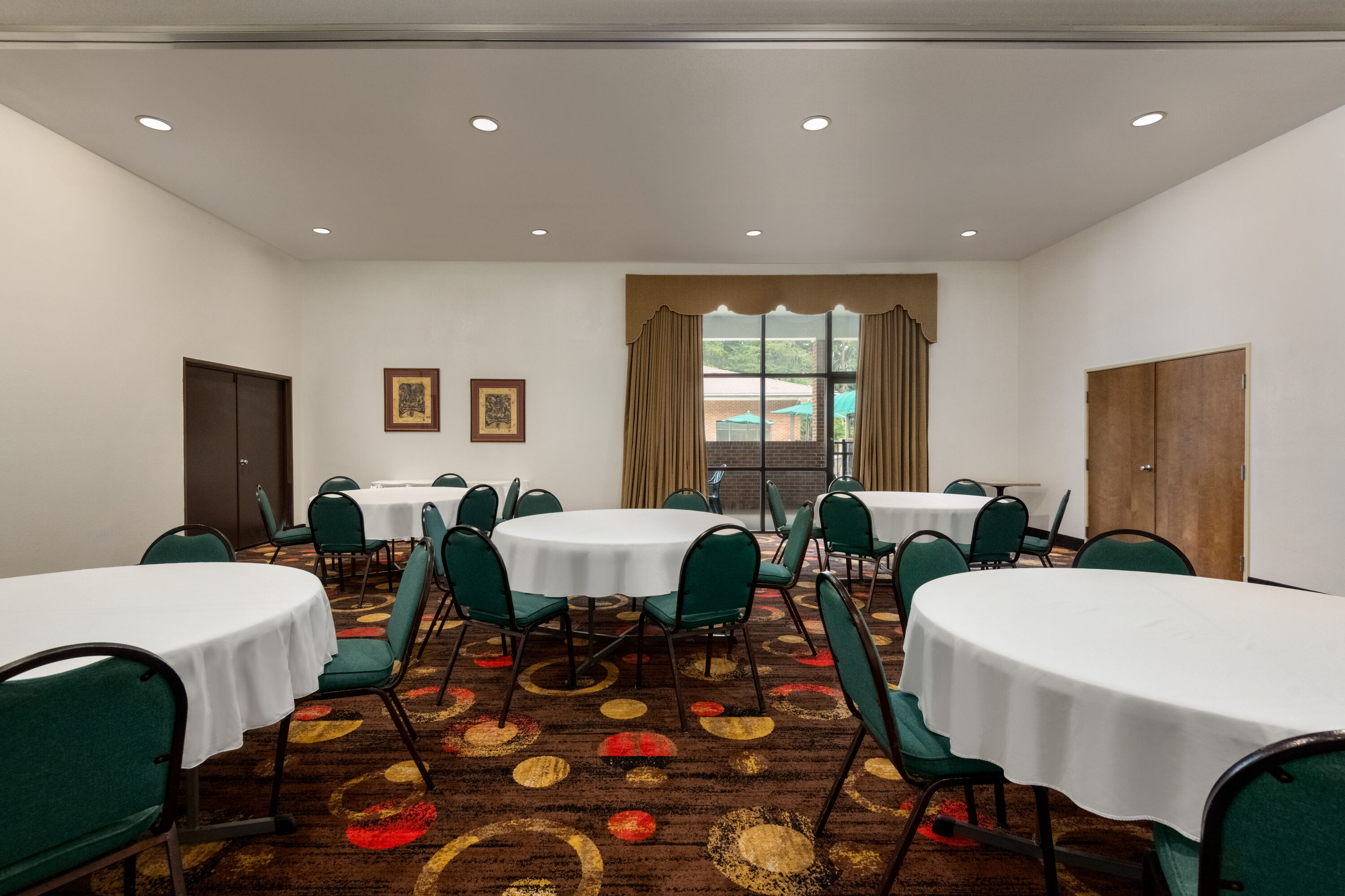 Meeting room banquet rounds at Days Inn by Wyndham Lexington in Lexington, North Carolina