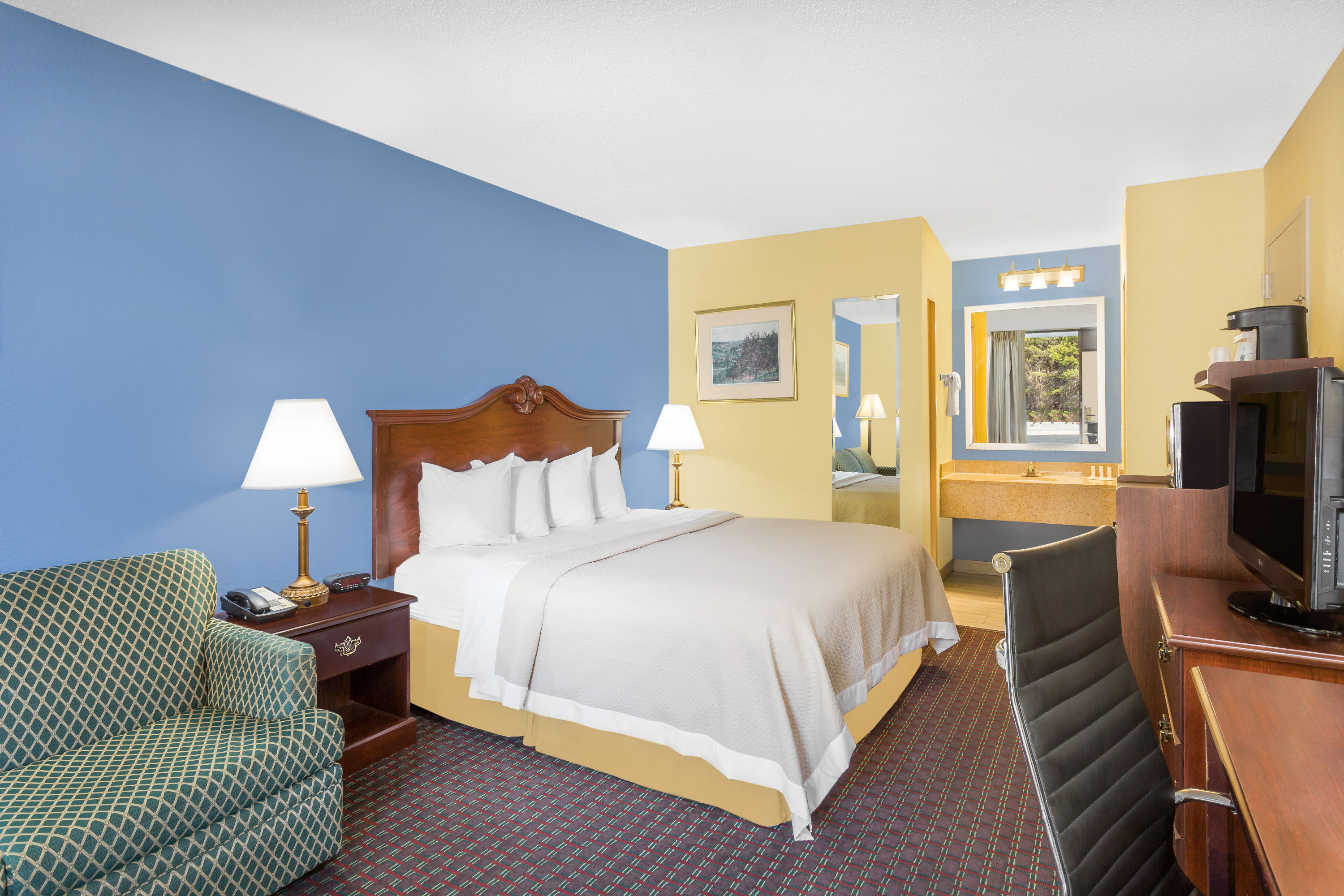 Guest room at the Days Inn by Wyndham Mocksville in Mocksville, North Carolina
