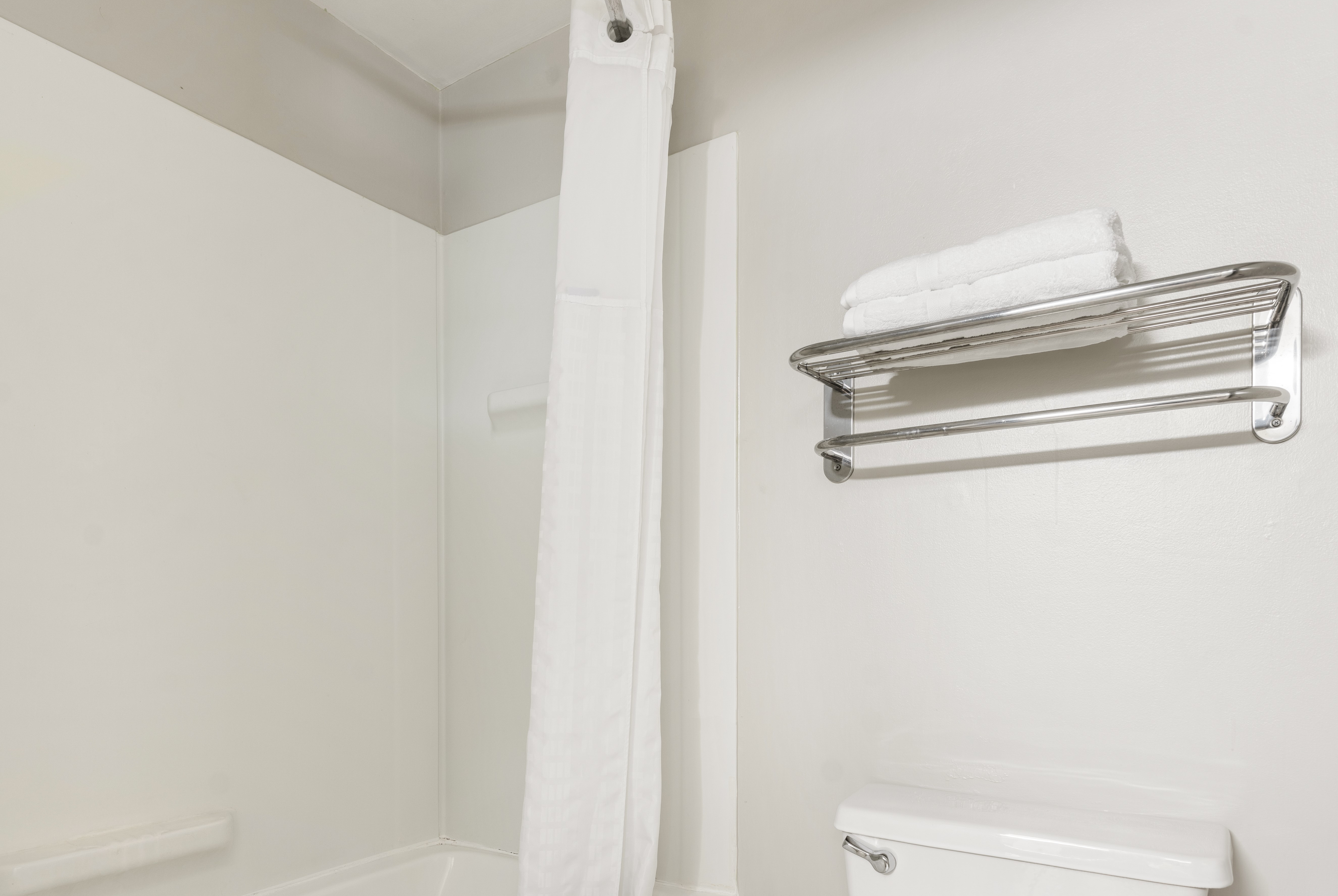 Guest room bath at the Days Inn by Wyndham Raleigh-Airport-Research Triangle Park in Morrisville, North Carolina