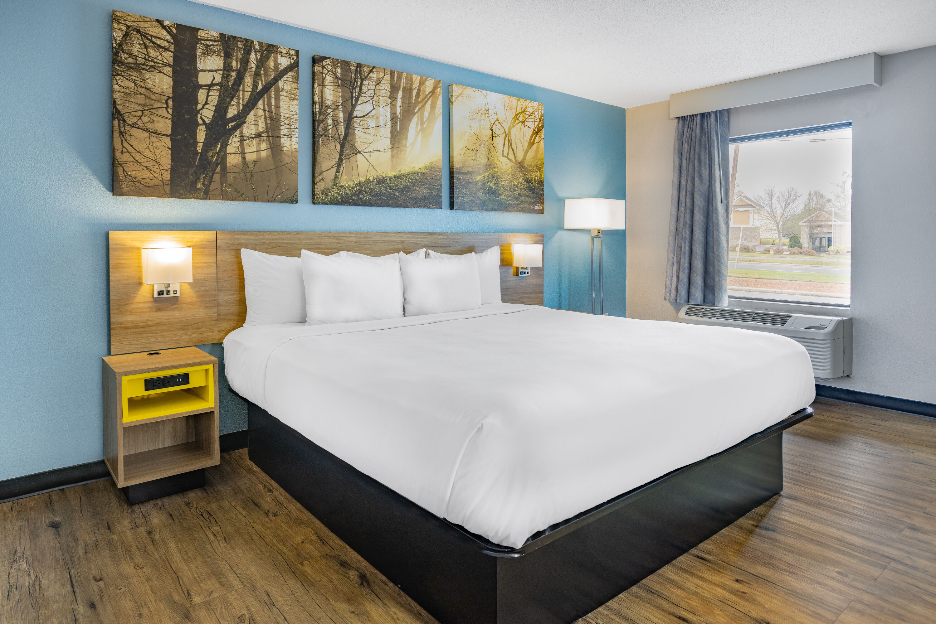 Guest room at the Days Inn by Wyndham Raleigh Glenwood-Crabtree in Raleigh, North Carolina