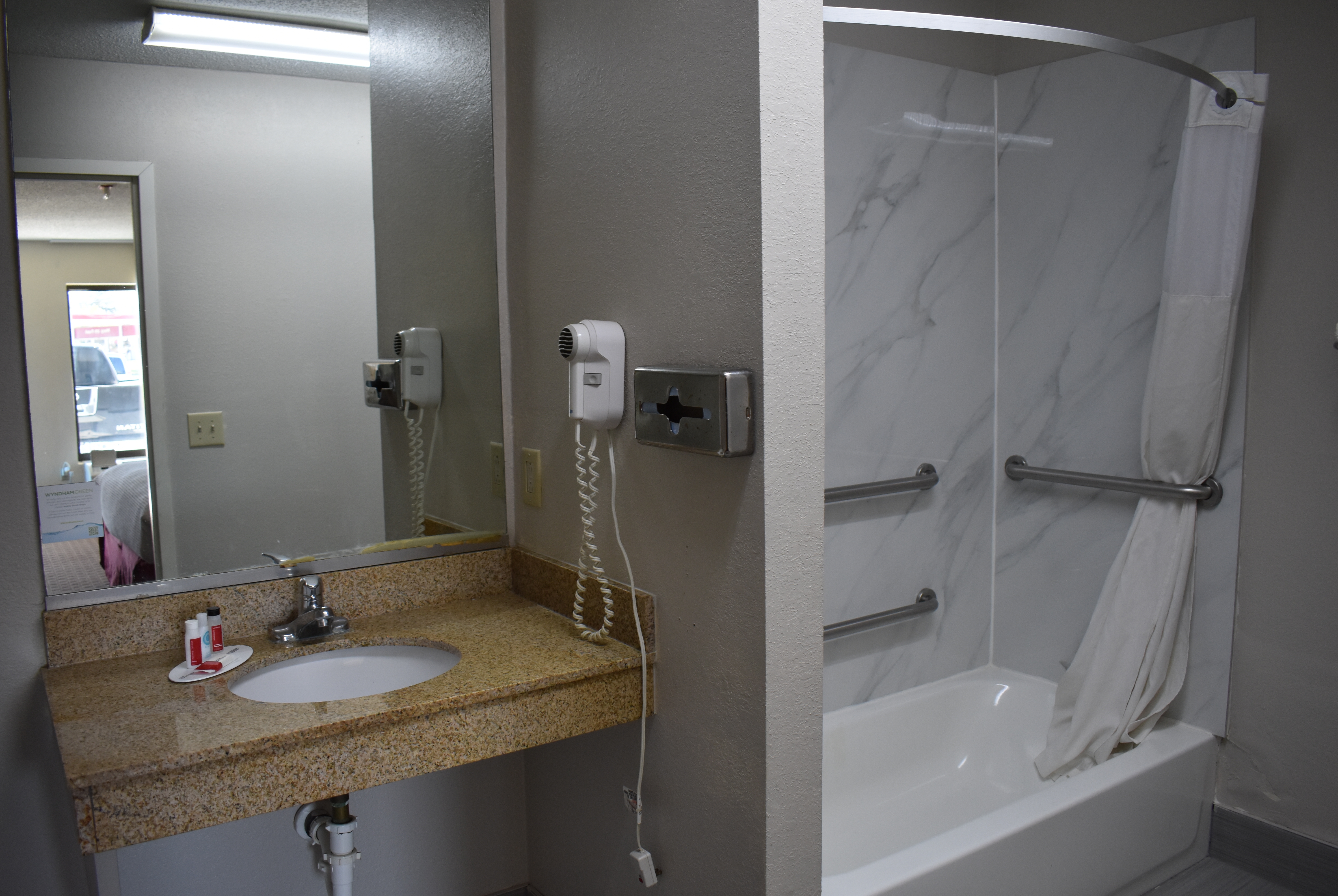 Guest room bath at the Days Inn by Wyndham Reidsville in Reidsville, North Carolina