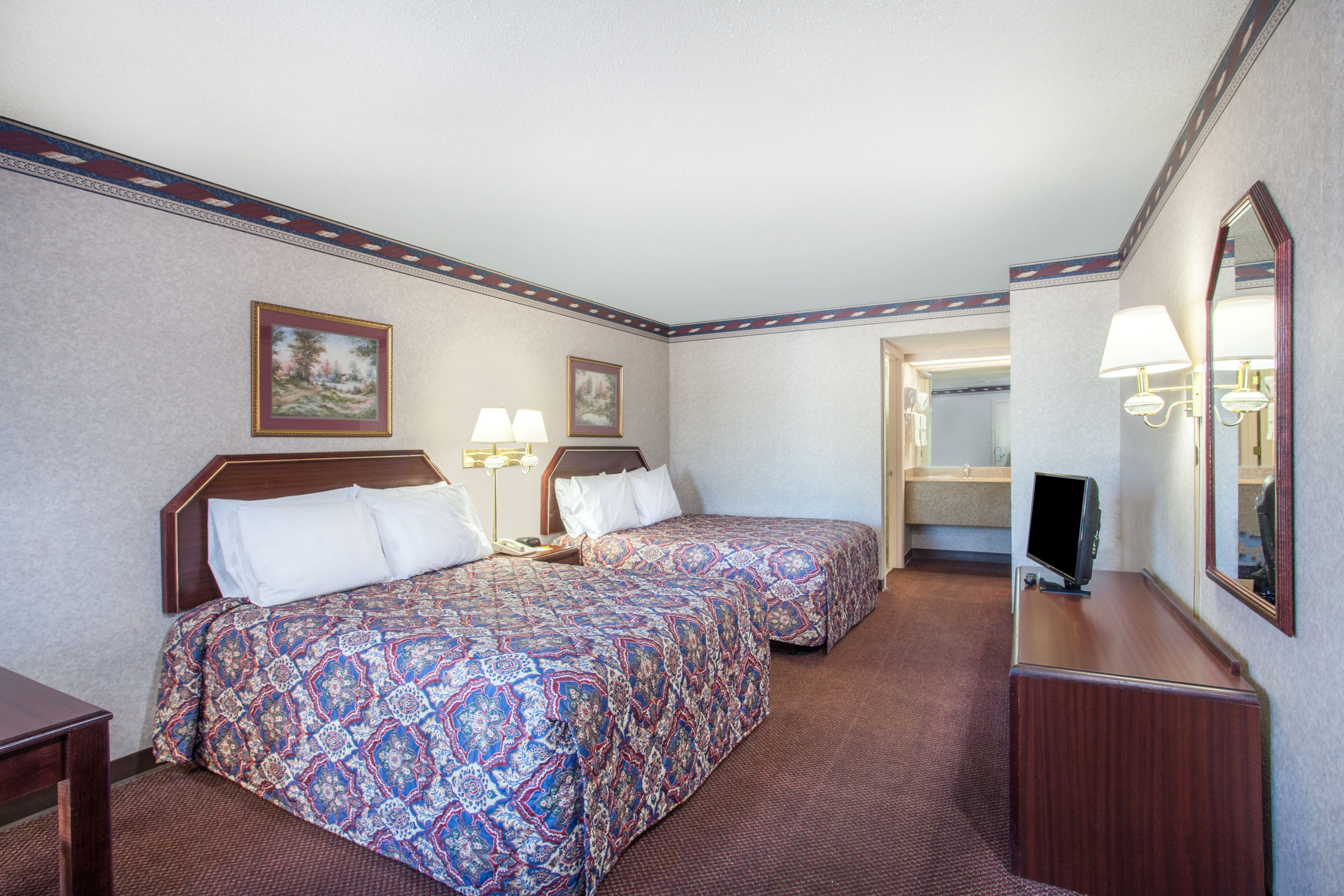 Guest room at the Days Inn by Wyndham Saint Pauls in Saint Pauls, North Carolina