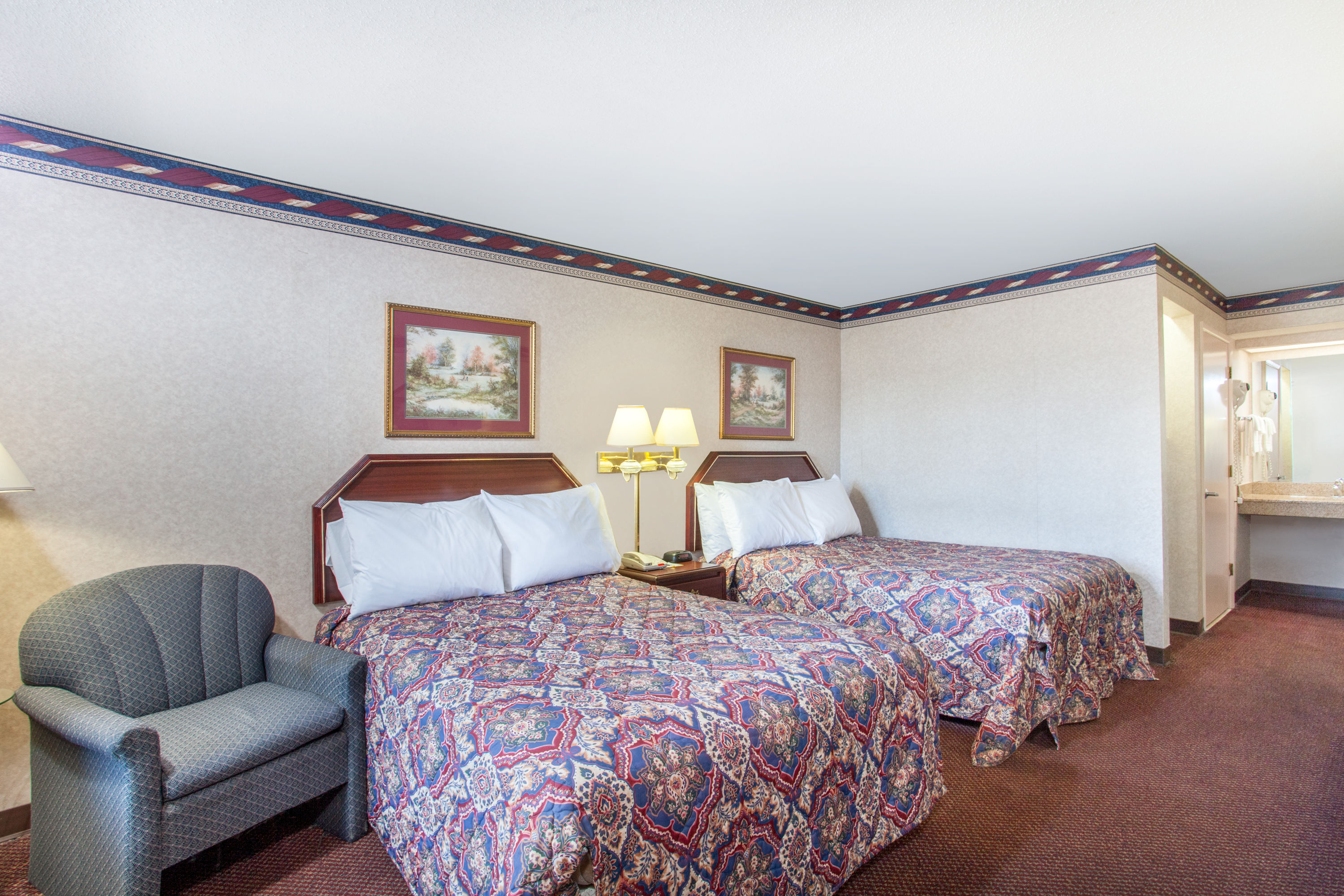 Guest room at the Days Inn by Wyndham Saint Pauls in Saint Pauls, North Carolina