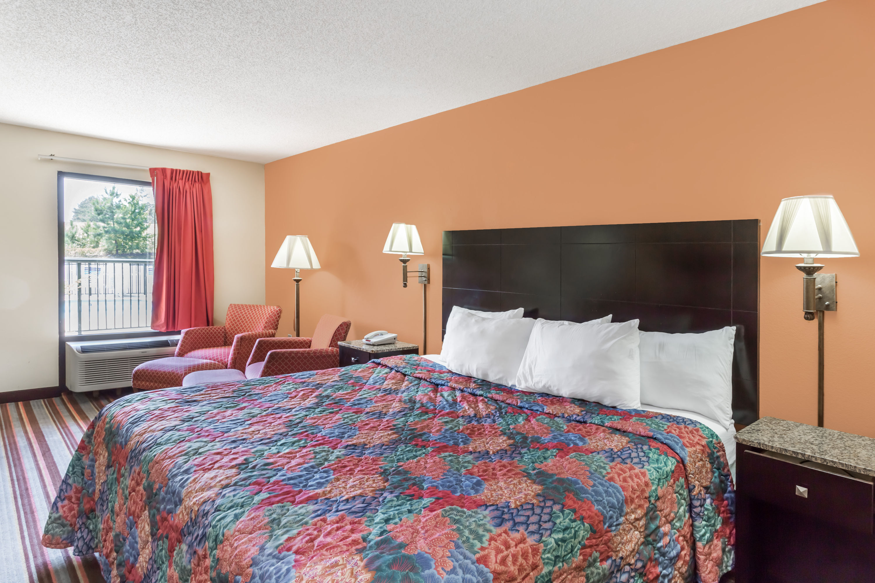 Guest room at the Days Inn by Wyndham Sanford in Sanford, North Carolina