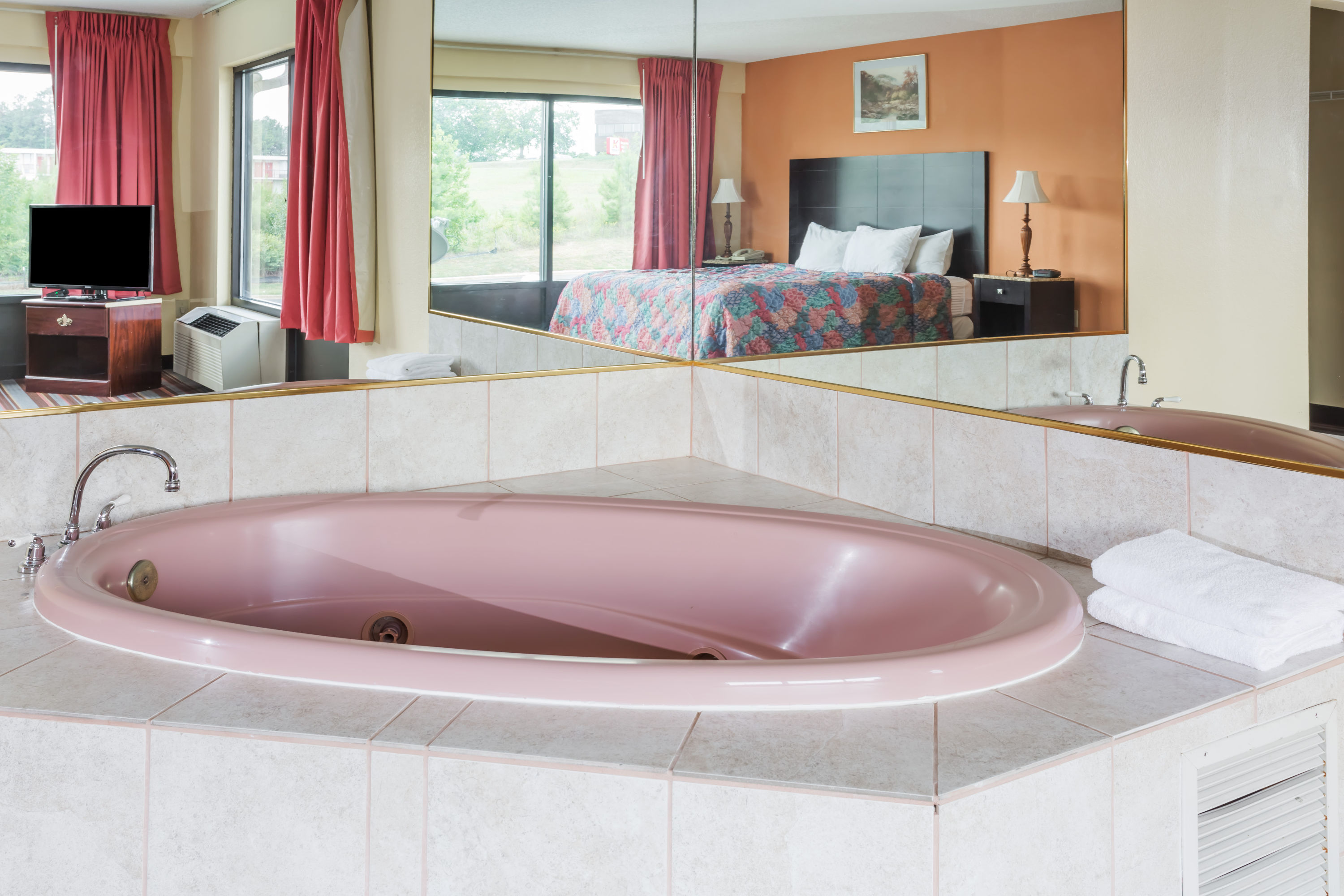 Guest room at the Days Inn by Wyndham Sanford in Sanford, North Carolina