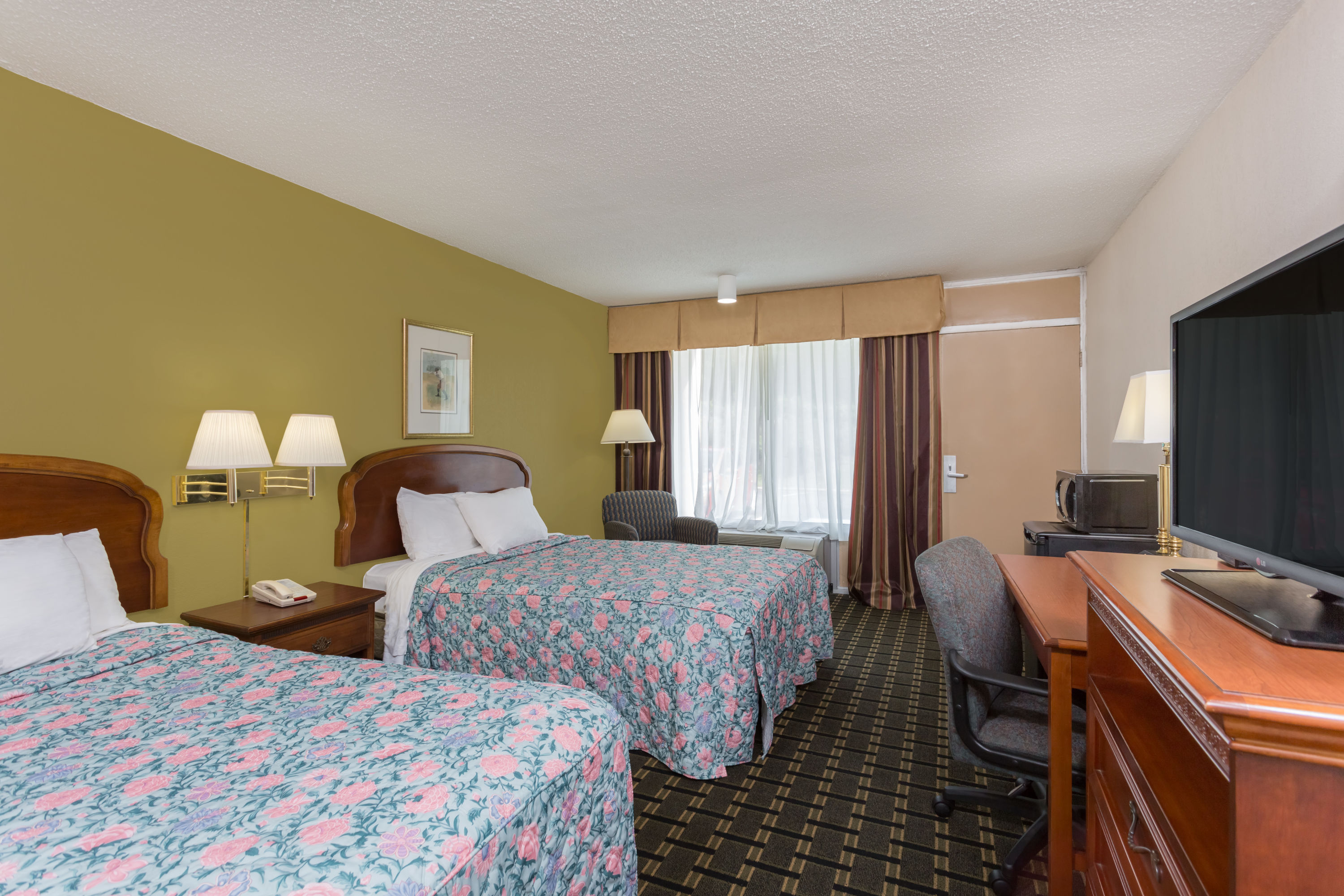 Guest room at the Days Inn & Conf Center by Wyndham Southern Pines Pinehurst in Southern Pines, North Carolina
