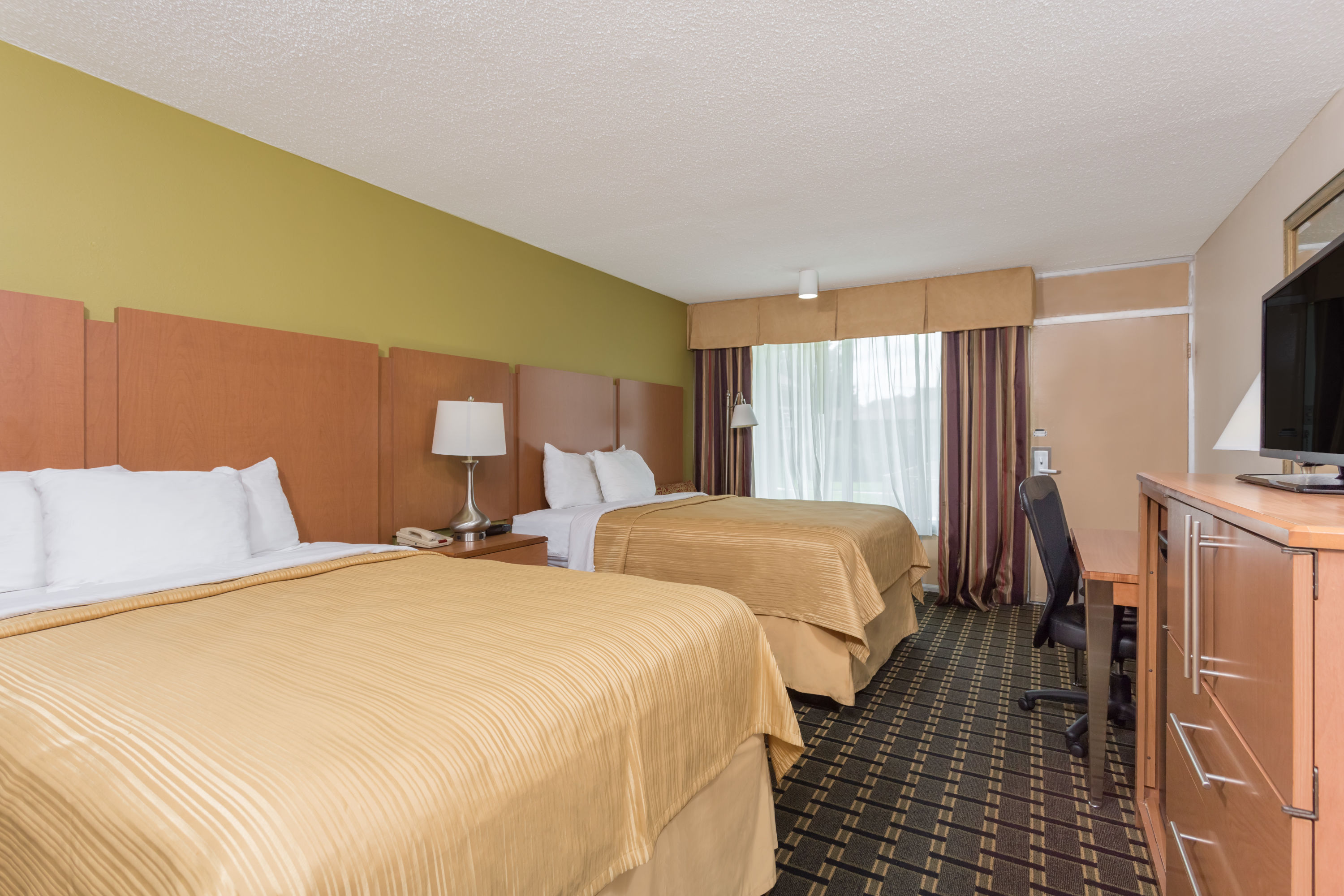 Guest room at the Days Inn & Conf Center by Wyndham Southern Pines Pinehurst in Southern Pines, North Carolina