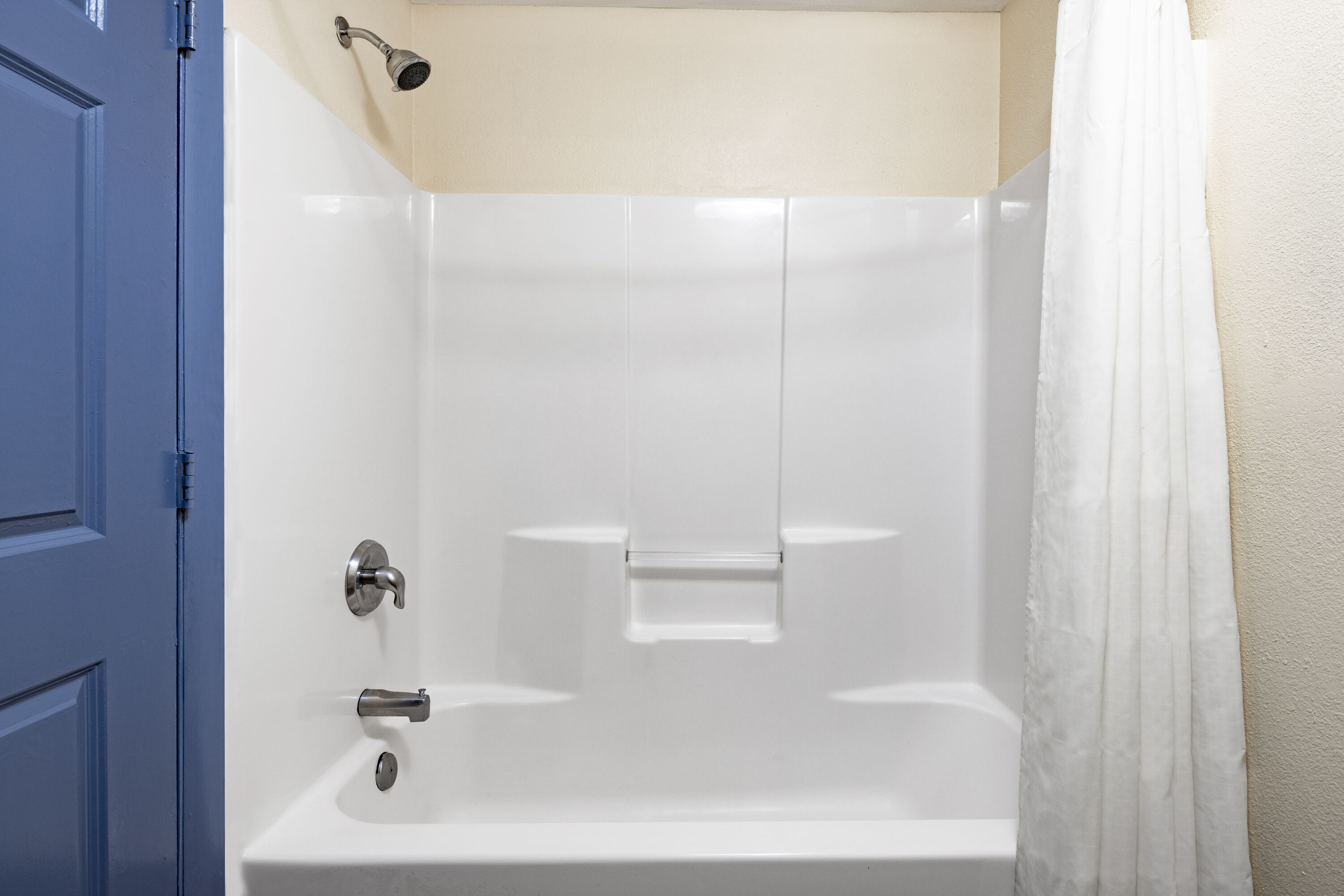 Guest room bath at the Days Inn by Wyndham Waynesville NC in Waynesville, North Carolina