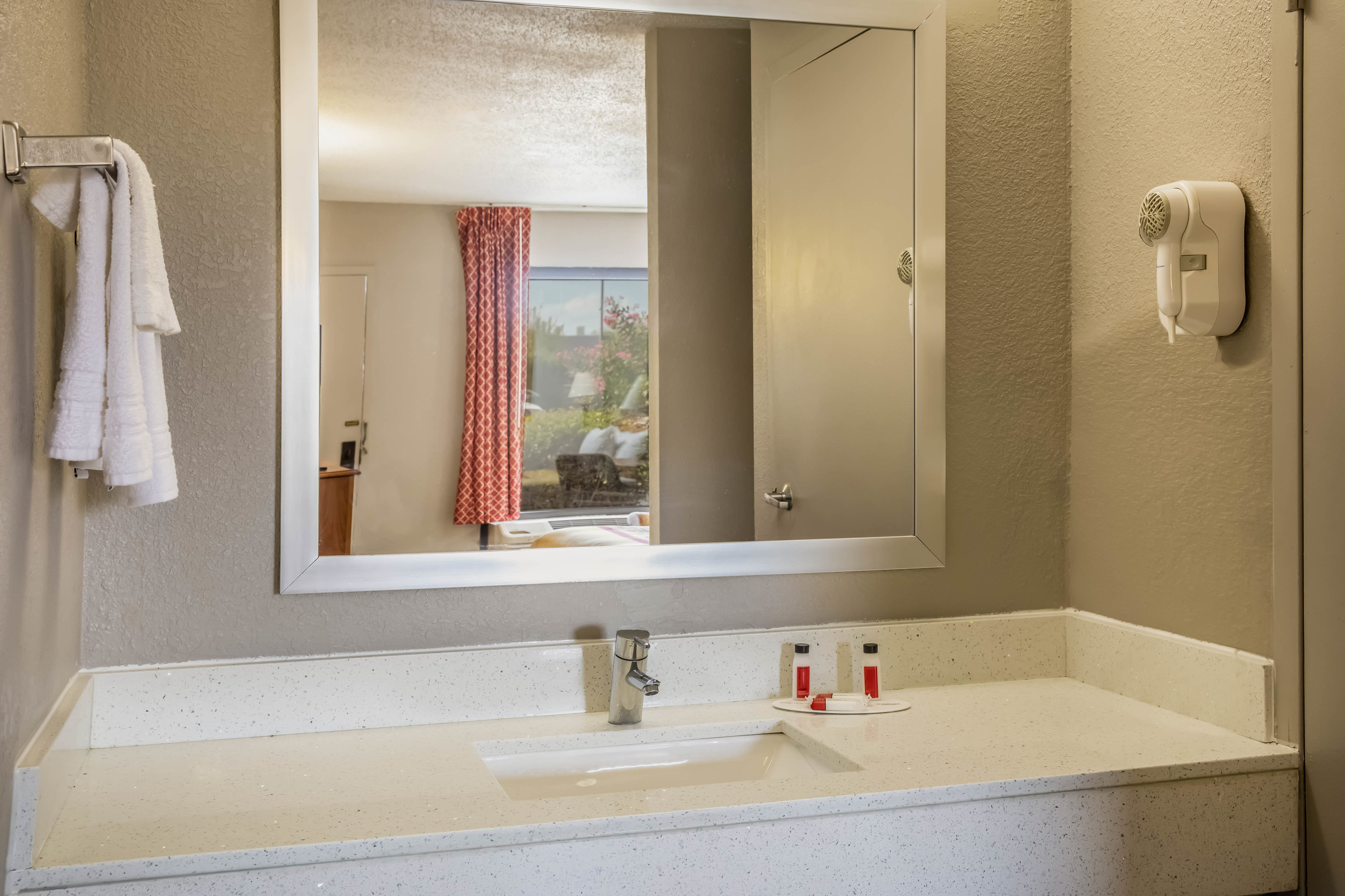 Guest room bath at the Days Inn by Wyndham, Wilson in Wilson, North Carolina