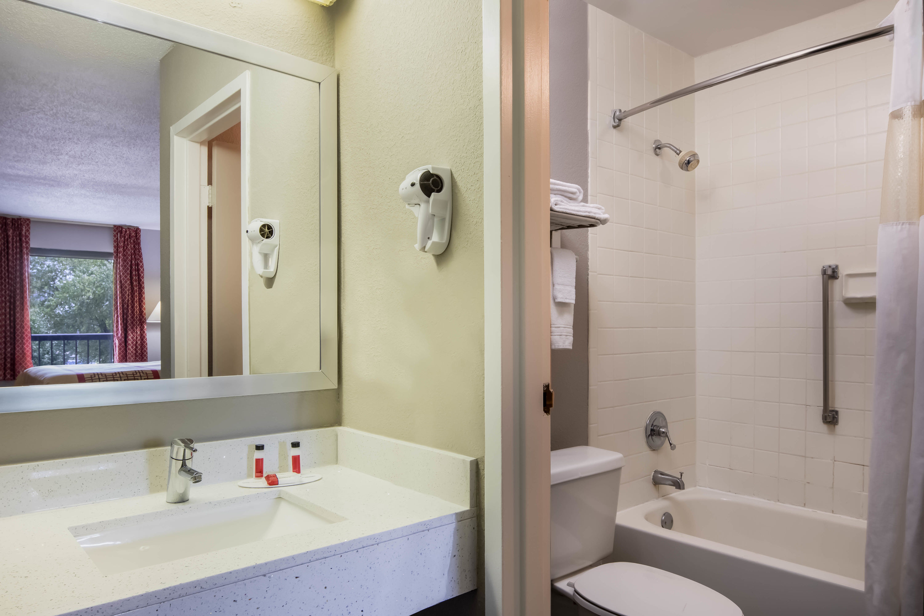 Guest room bath at the Days Inn by Wyndham, Wilson in Wilson, North Carolina